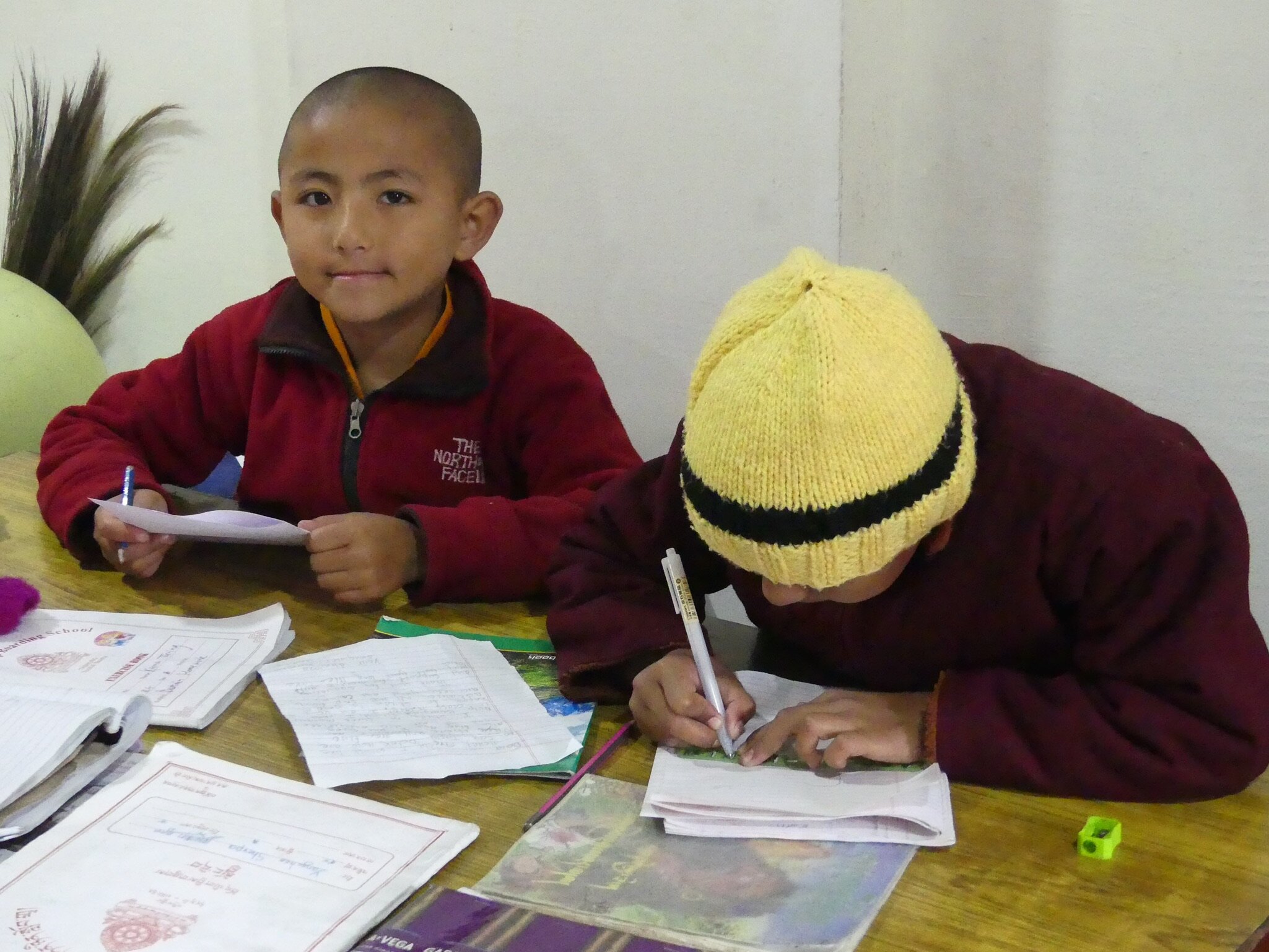  Young nuns learning to read and write at Tara Abbey. 