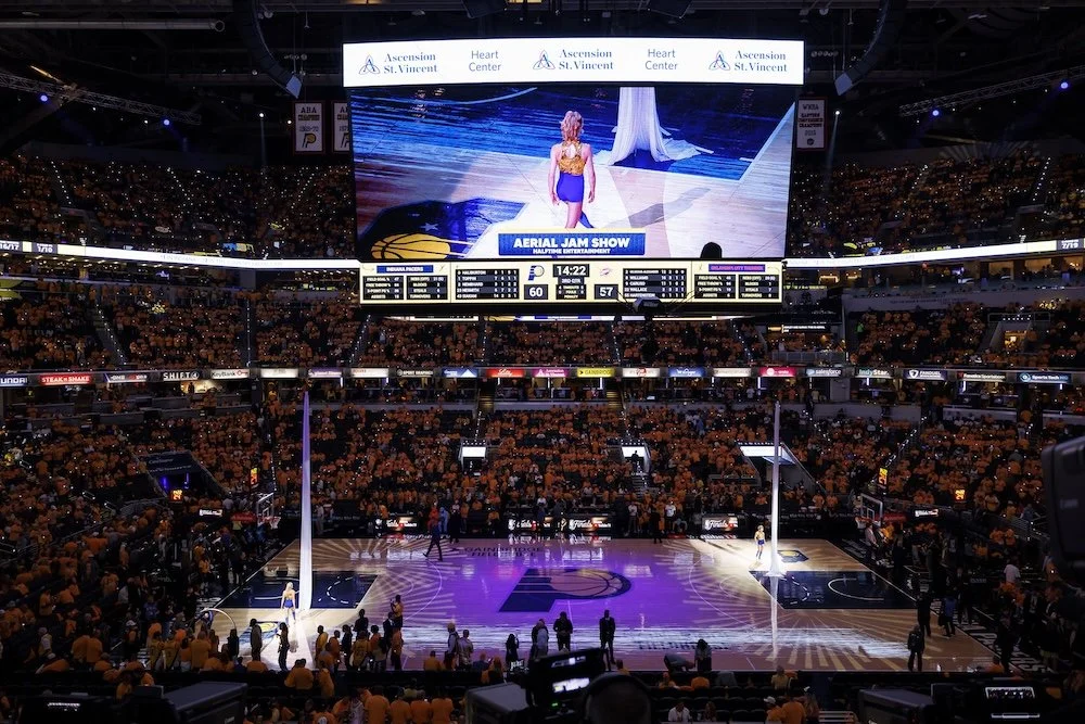Grace Good performing aerial silks at Indianapolis Pacers NBA Halftime
