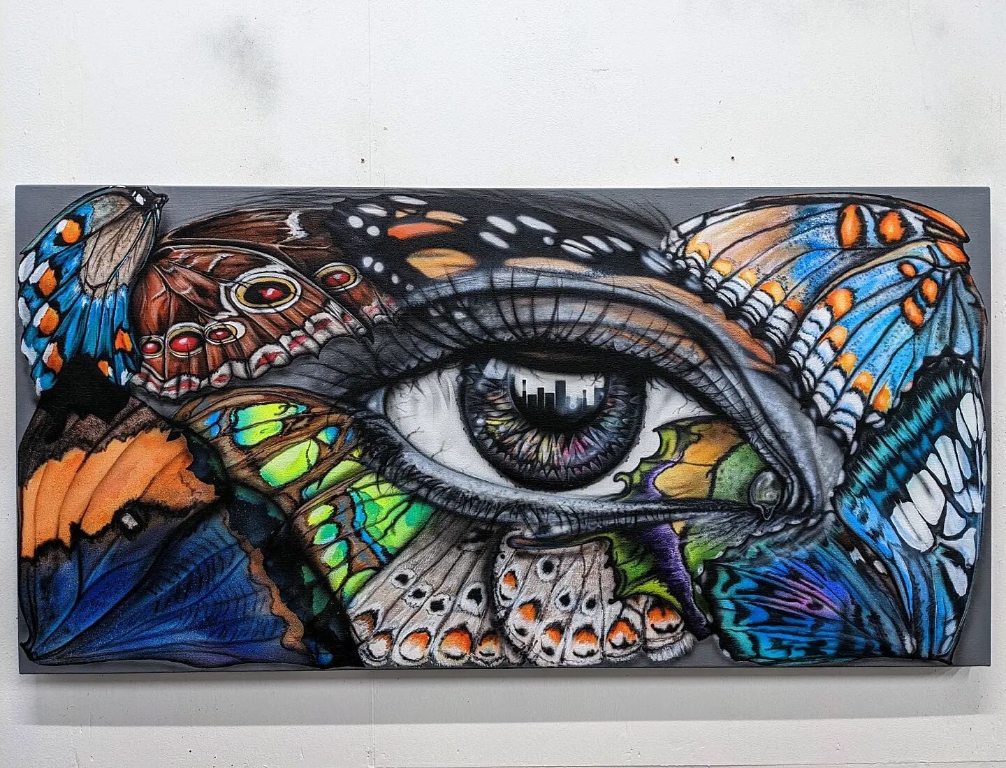 &quot;Endangered sighting&quot;
Mediums: Acrylic, spray paint &amp; airbrush on canvas
24in x 48in
-
After taking some time to reflect I accepted this as a completed painting. The wings are of butterfly species that are endangered or threatened by cl