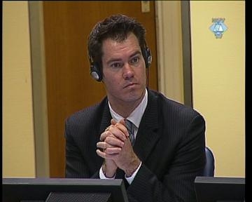 Nick Oberheiden wearing headphones UN Criminal Tribunal