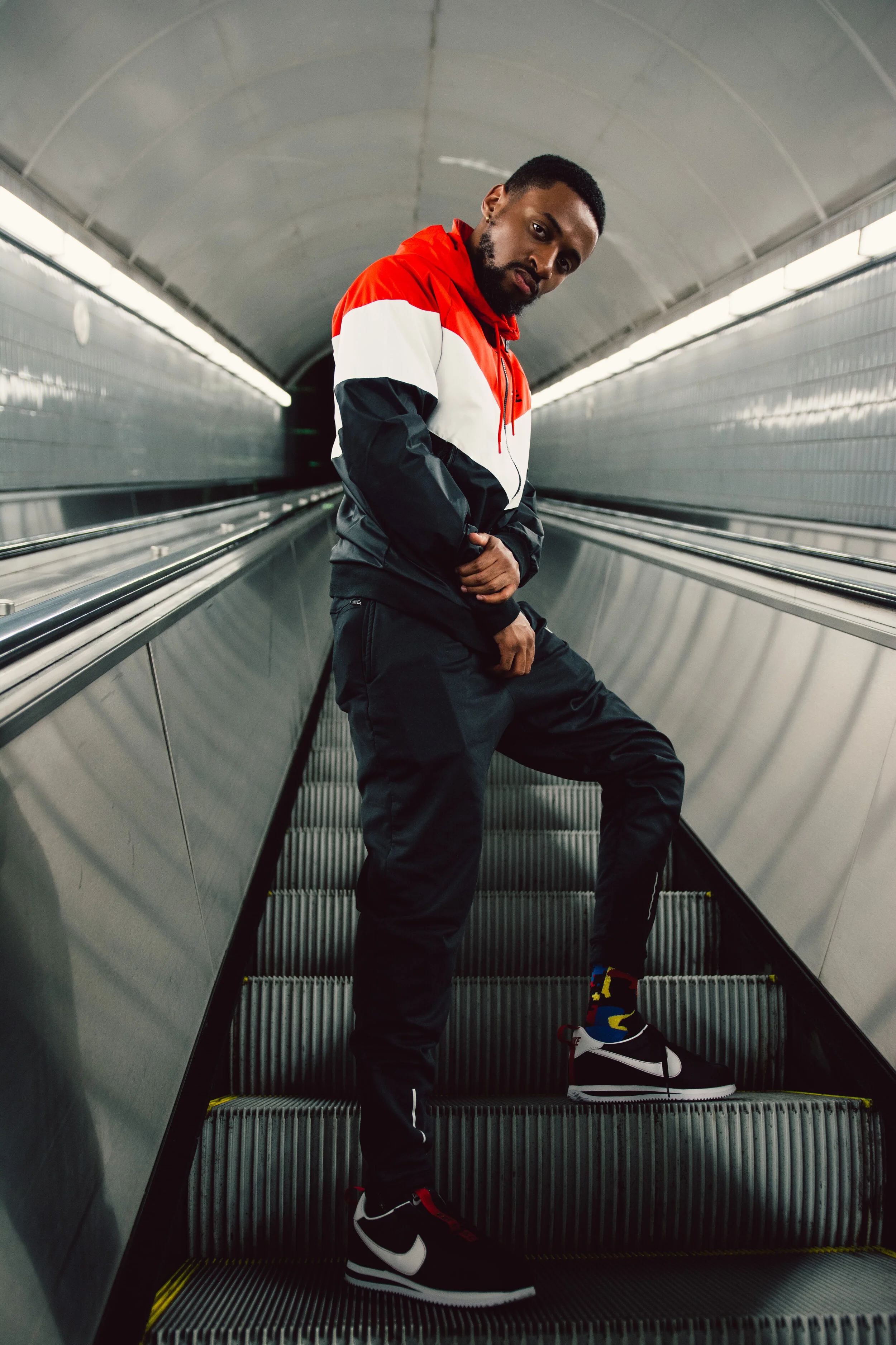 Bakari B. Photo Taken By Essence Ransome. Jacket, Sweats, &amp; Kung Fu Kenny's By Nike. Socks By Stance.