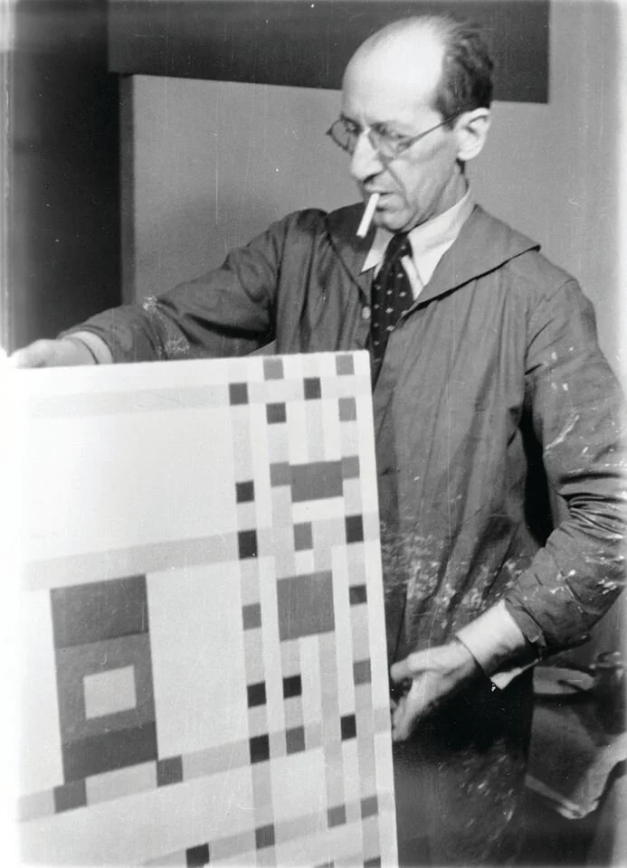 Piet Mondrian with&nbsp;Broadway Boogie Woogie, New York, 1943. Photo by Fritz Glarner. Courtesy the Collection RKD – Netherlands Institute for Art History.