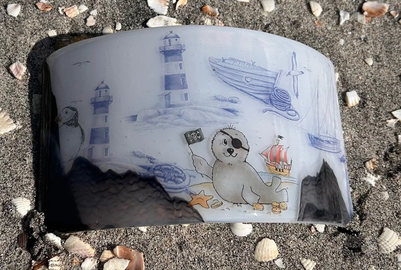 Curved glass beach scene