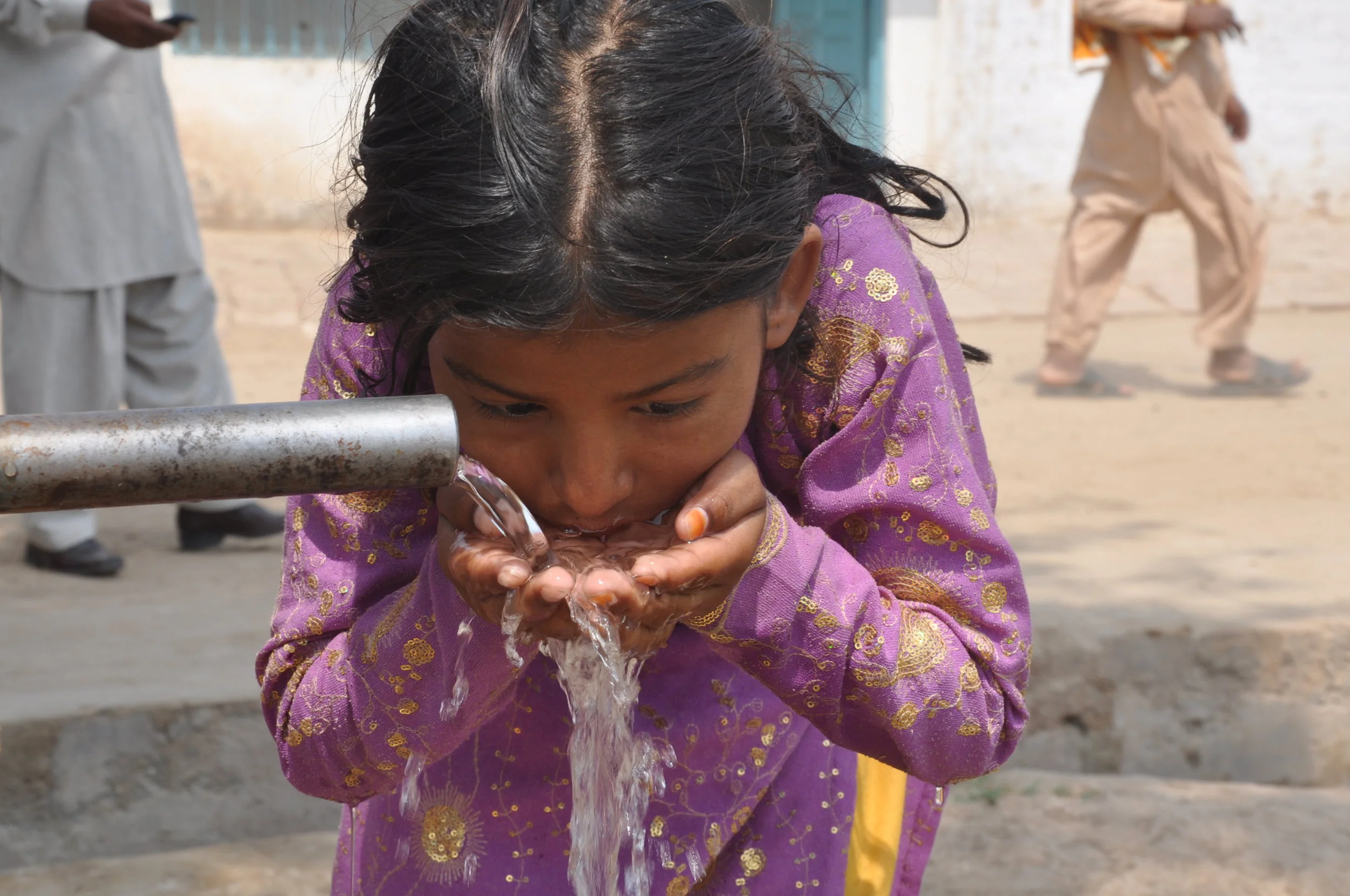 Girl Drinking Water.JPG