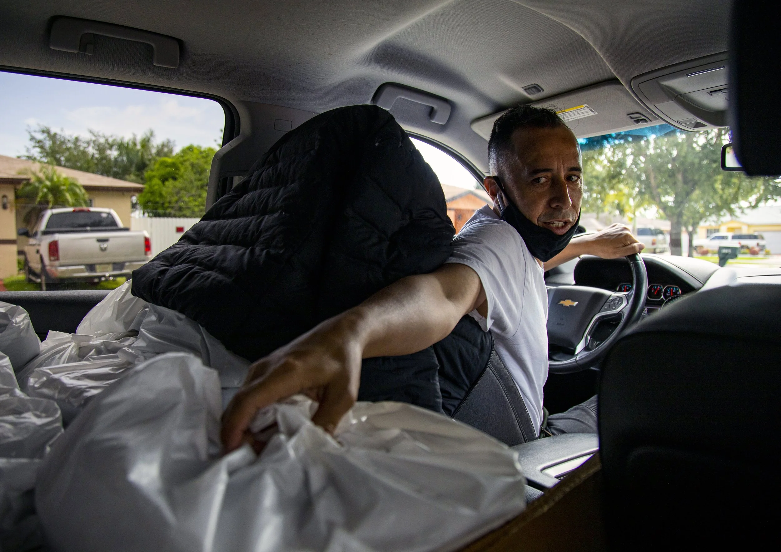 As he navigates the difficult asylum system, Julio Rodriguez spends time delivering food for a COVID relief group. Photo Courtesy of eNH