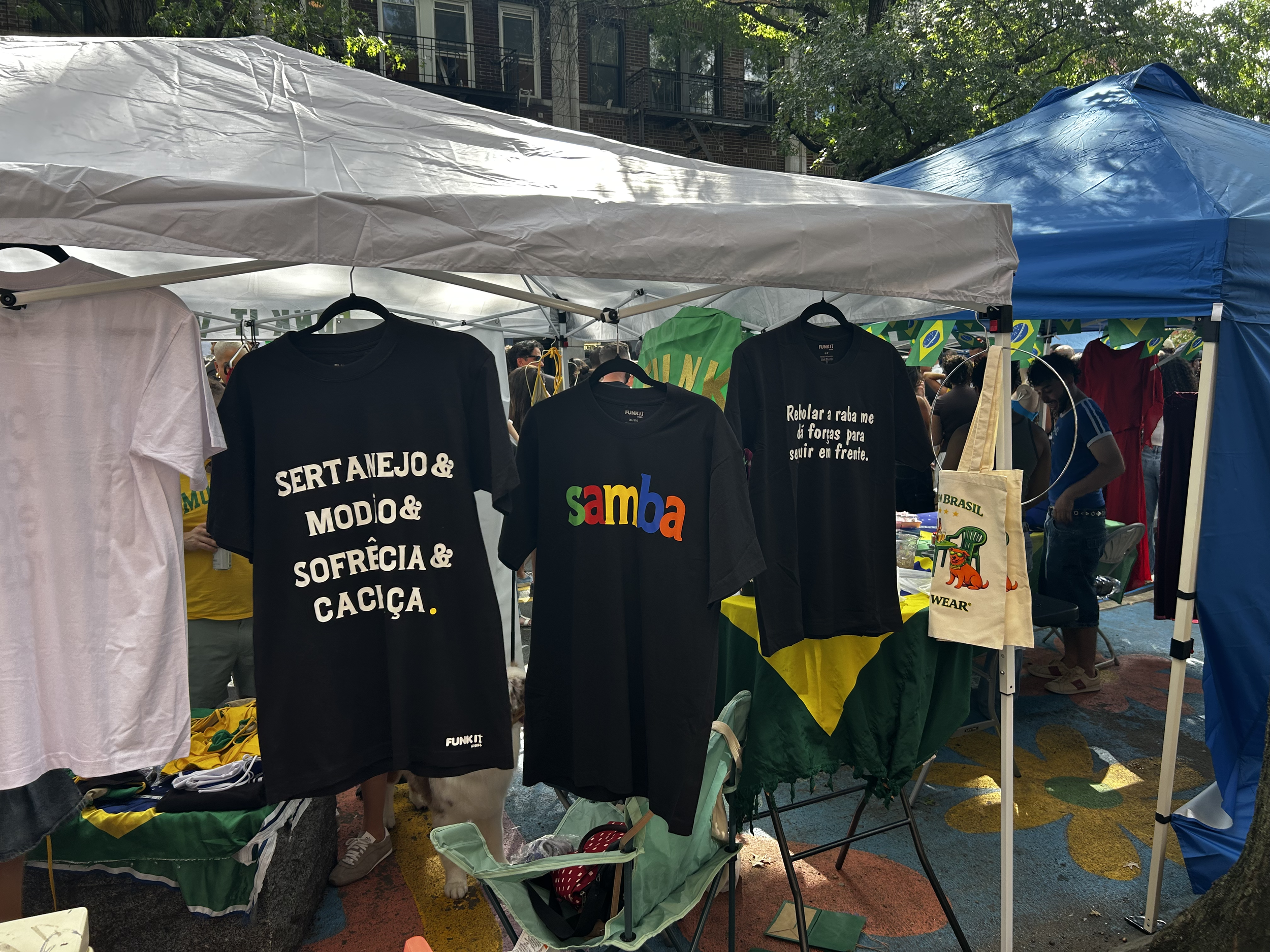  Dozens of small businesses came to Brasil Fest, including T-shirt designers with references to national culture. 