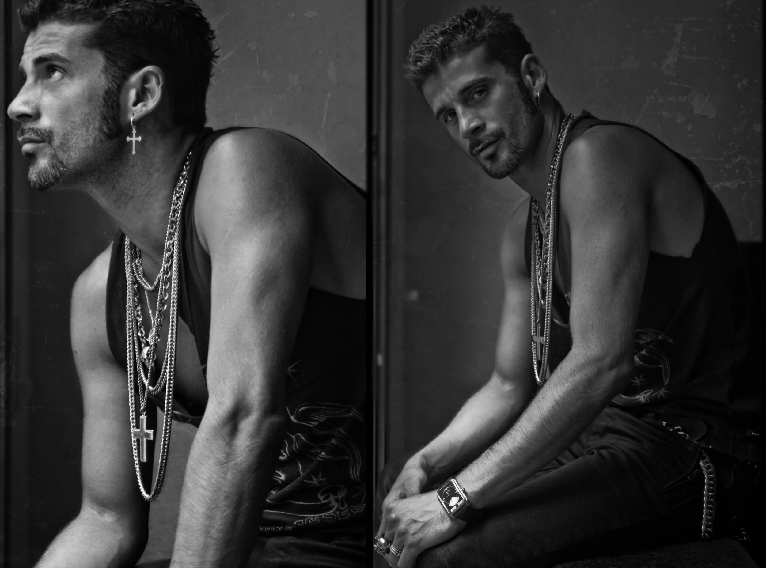 A black and white diptych photograph of a young man with dark, curly hair and stubble, wearing a sleeveless shirt, multiple necklaces, and earrings, sitting against a textured wall. In the left panel, he is shown in profile looking upward; in the rig