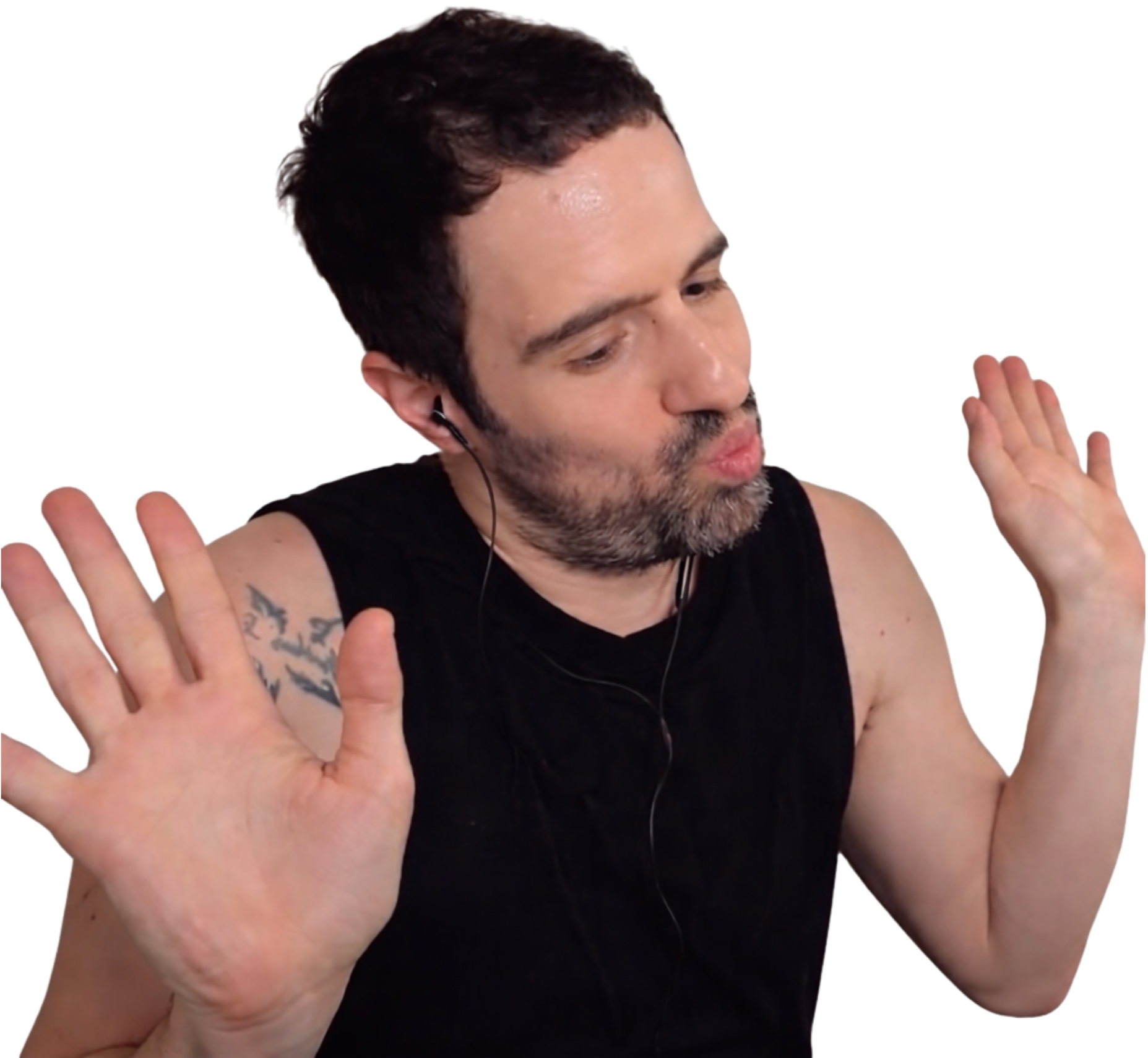 Martin Cirio, cabello oscuro, sin camisa, usando auriculares, levantando las manos con expresión de sorpresa o desconcierto.