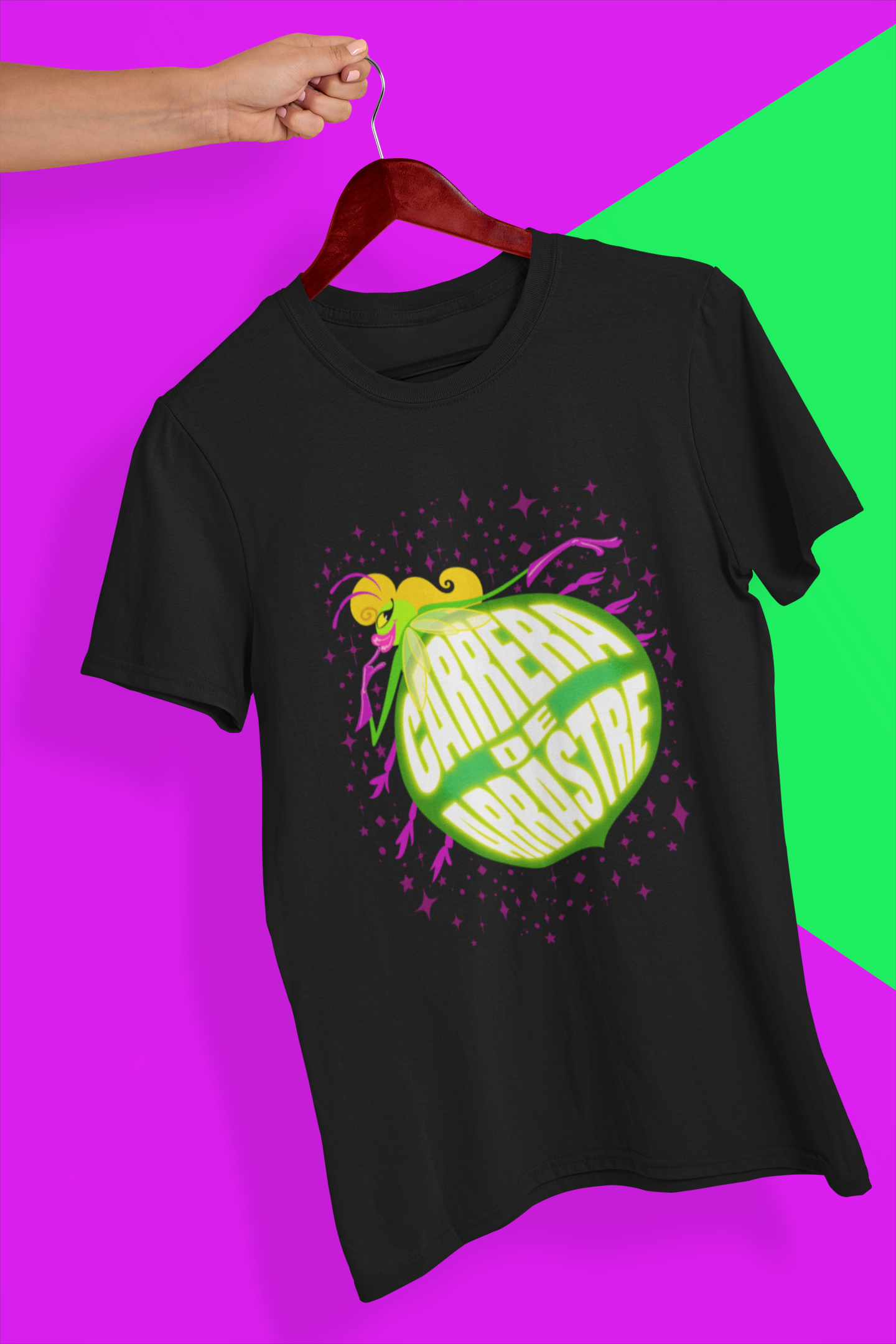 mockup-of-a-hand-holding-a-t-shirt-in-a-colorful-background-26735.png