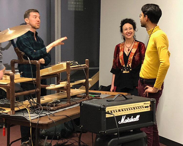Andrea Clearfield, Composer (center) and Manoj Kamps, Director (right) discuss custom instruments.