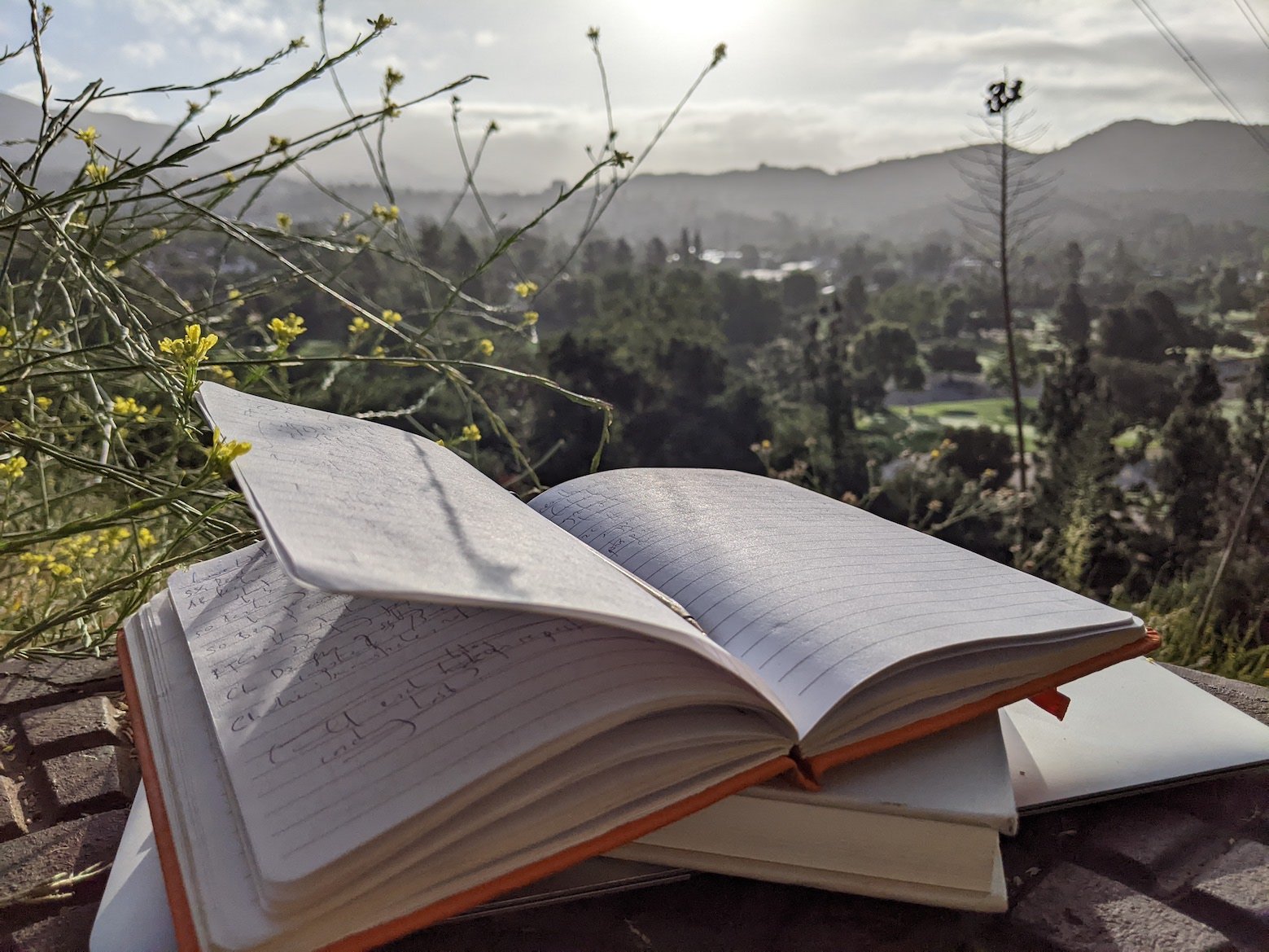 open notebook with a mountain view