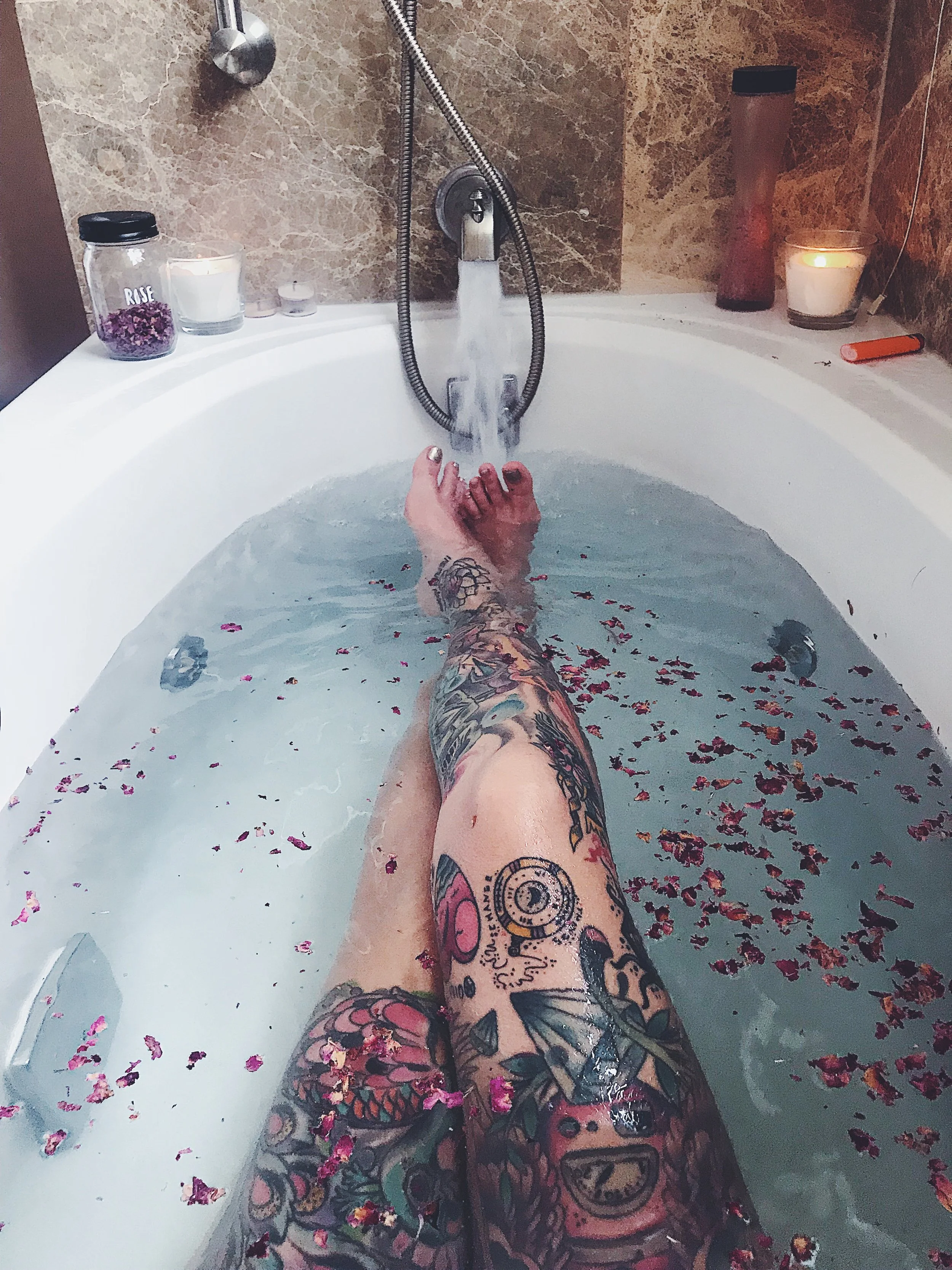 Bath magic with rose petals and herbs by Sabrina Scott