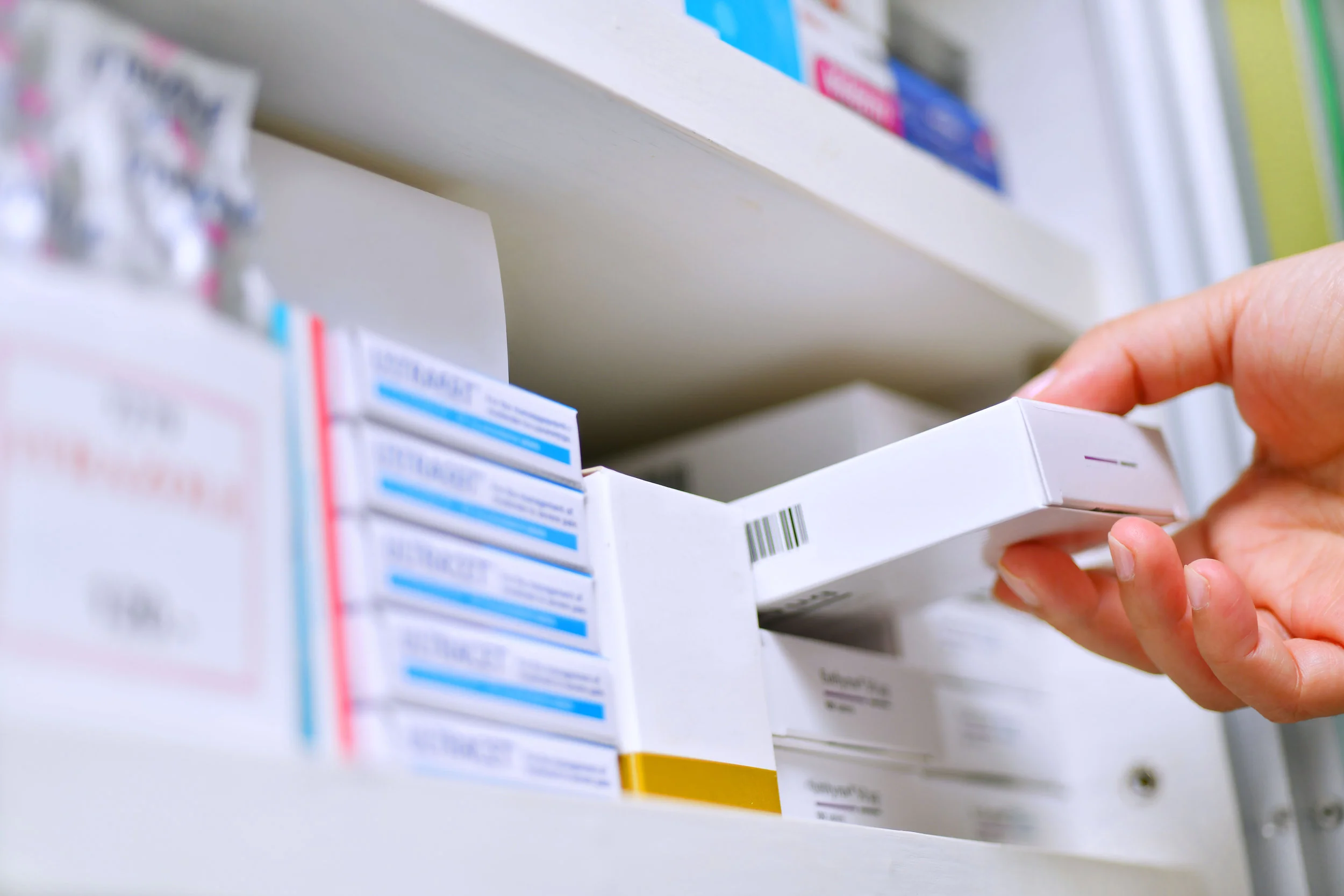 bigstock-Closeup-Pharmacist-Hand-Holdin-302997259.jpg