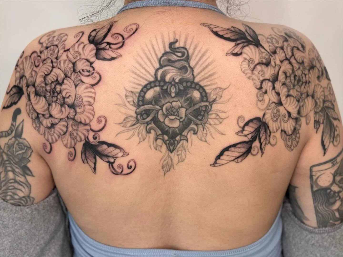 ONE HEALED &amp; ONE FRESH. APRIL 2024. Sister peonies on shoulders framing an incredible and lovely piece in the center from @tattoosby_ursula . Loved making this and would love to make more! 

▪️Made at @spottedpanthertattoo▪️
▪️Made with @sombragr