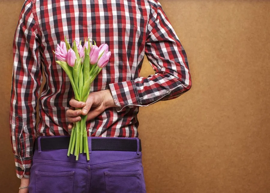 valentines-day-man-with-flowers-e1470394885352.jpg