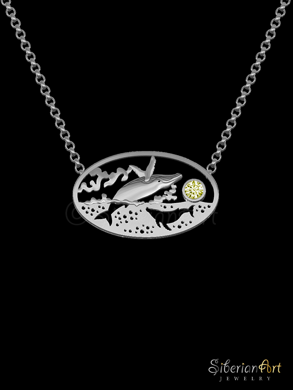 The jewelry design inspired by the image, I wanted to tell the story of both worlds above and below water at the same time. Still dreaming about trying to capture a real image showing both worlds this way :)