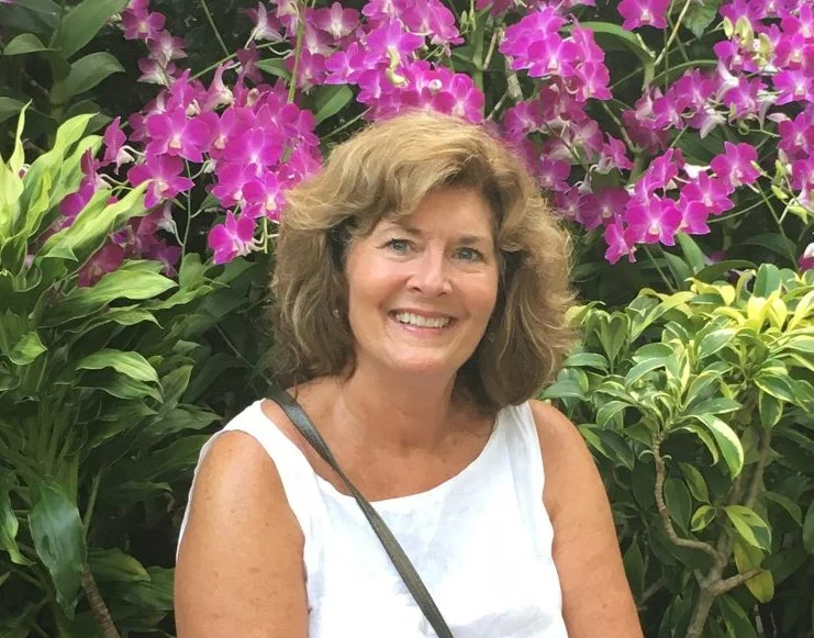 Janelle with orchids2.jpg