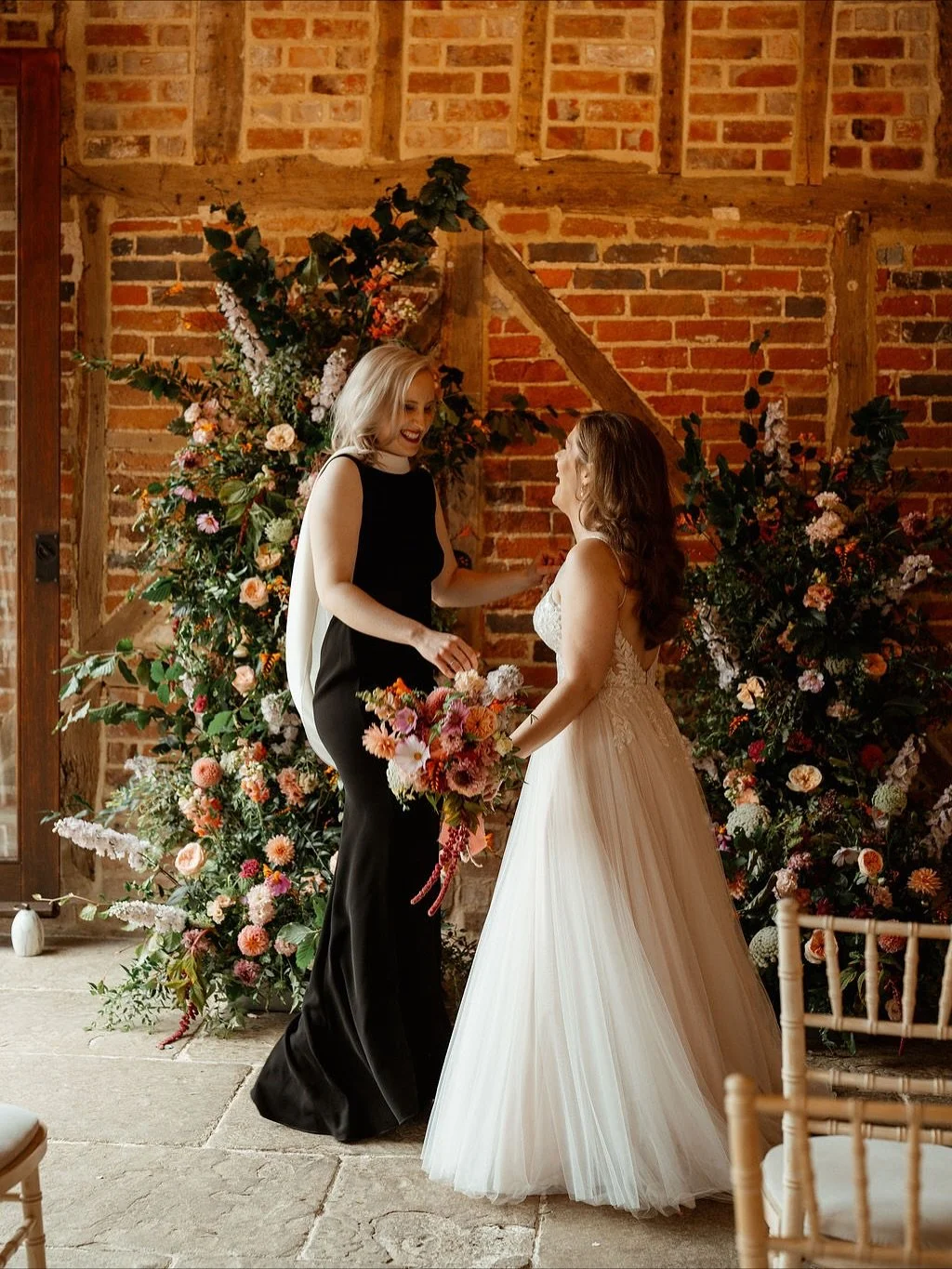 When the ceremony was over, and I was about to move all the flowers to the reception, I found a quiet moment with Zanna &amp; Steph dancing infront of their arch.
A moment of pure joy at being married, so romantic and full of love 💕 

👰🏼&zwj;♀️👰?