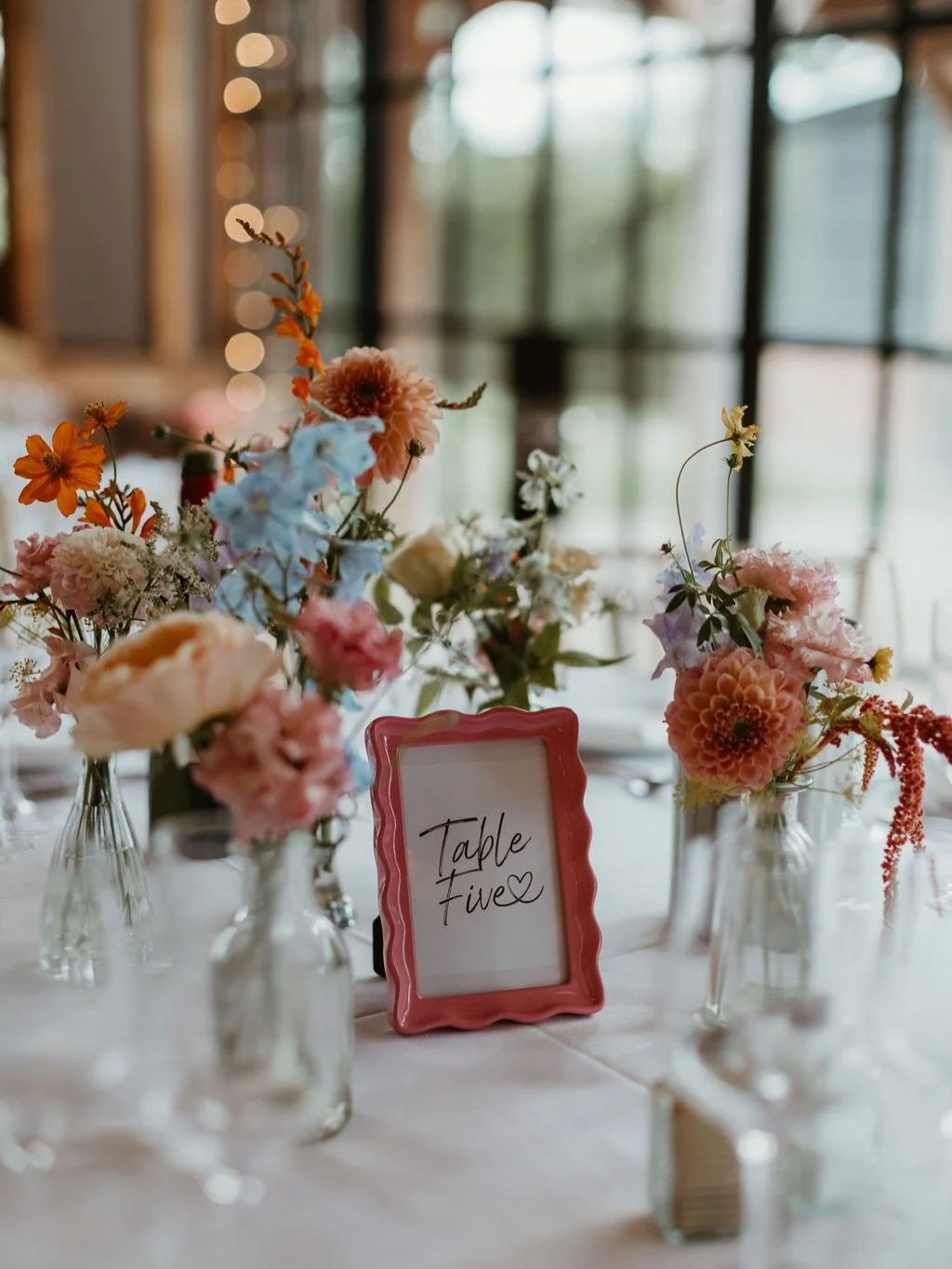 An abundance of bud vases - yes please 💕 

The sweetest pop of colour to any table,
Round or Long, 
Whether you have 3, 5, 25 or more! 
Wild, airy and colourful always 🌸🌼🌷

👰🏻&zwj;♀️👰🏻&zwj;♀️ - @gloria_amy @charlottehyett 
💐 - @lilyandliz 
?
