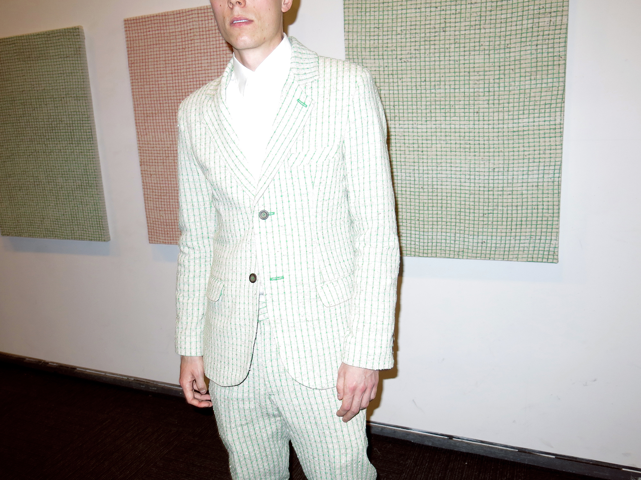 The artist in 2013 wearing a suit tailored to match his paintings.