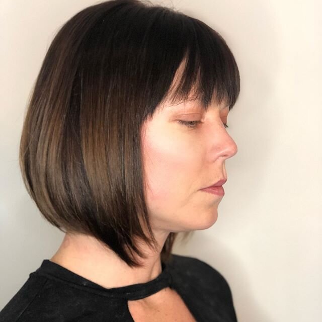 You can&rsquo;t go wrong with a classic bob and bangs 💁&zwj;♀️😍 This guest just moved to Charlotte all the way from Colorado 🏔 We evened out her color with a gorgeous rich brunette shade and snipped a couple inches ✂️ A fresh look for a fresh star