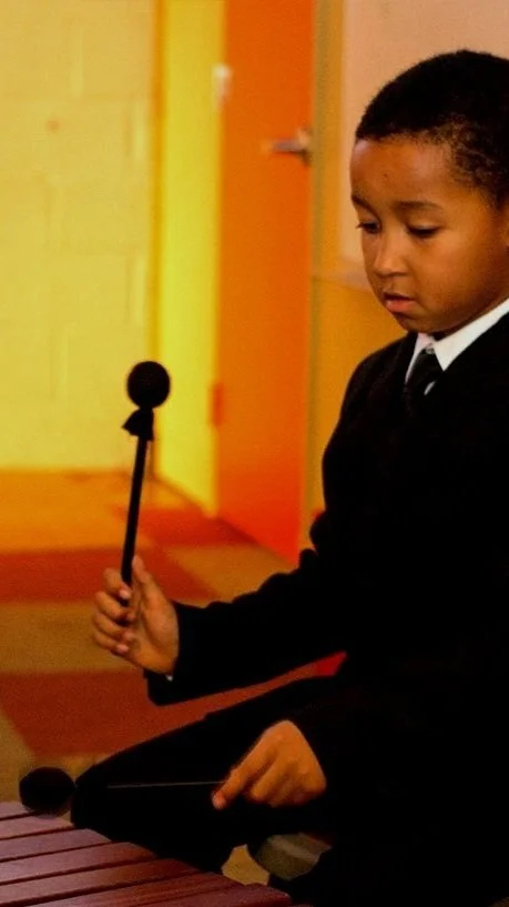 Kid-with-instrument.jpg