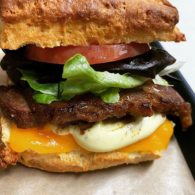 House smoked Tasso ham biscuit with lettuce, tomato, sharp cheddar &amp; rosemary garlic aioli on buttermilk biscuit