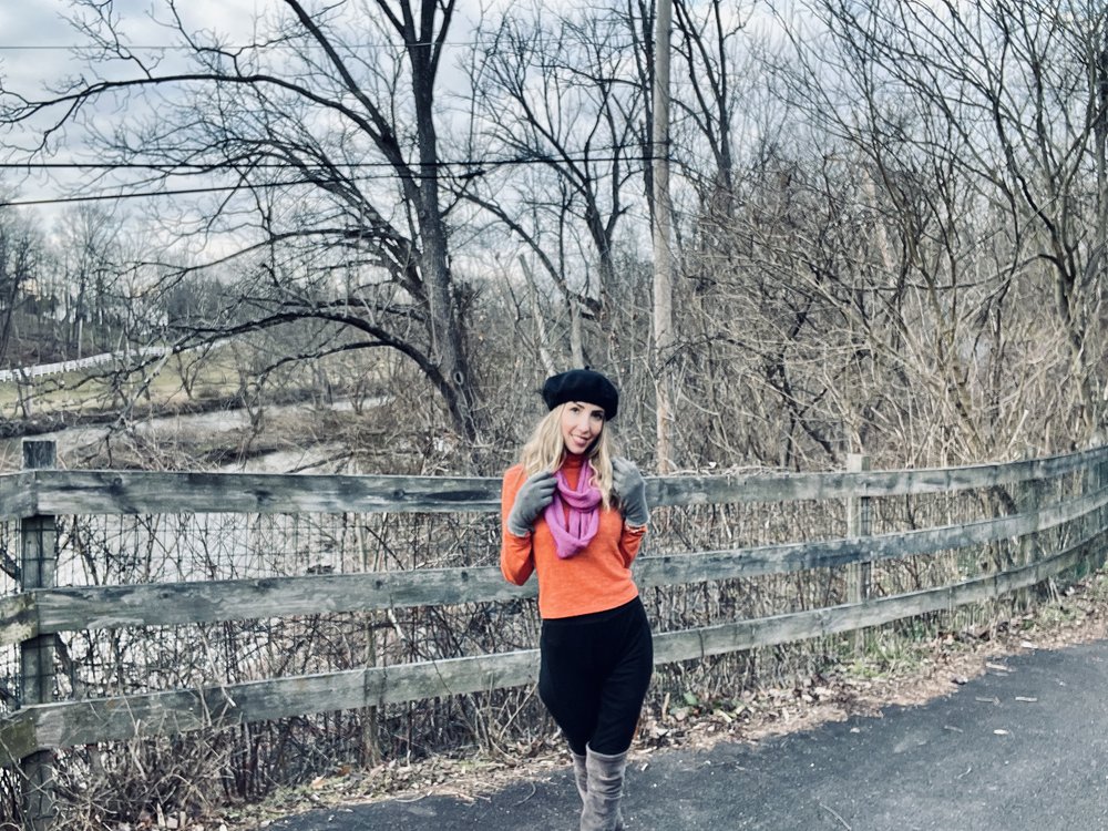 Woman Outside in Orange Sweater