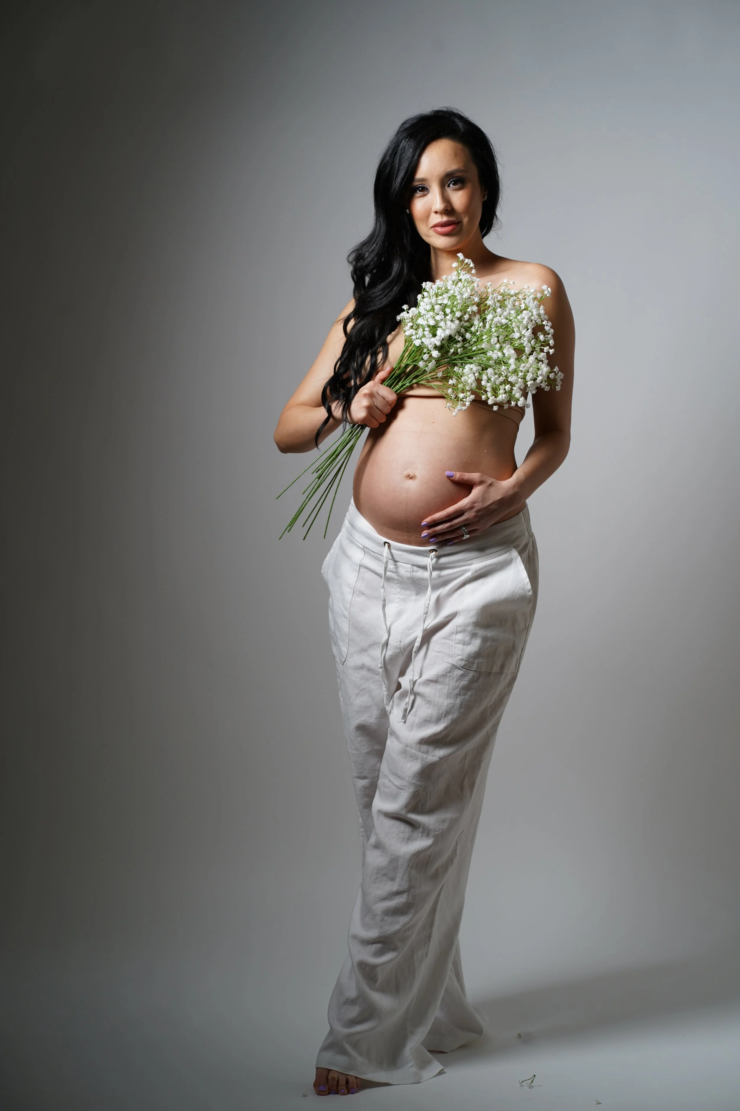 In studio maternity photos by Gerard in New York city.