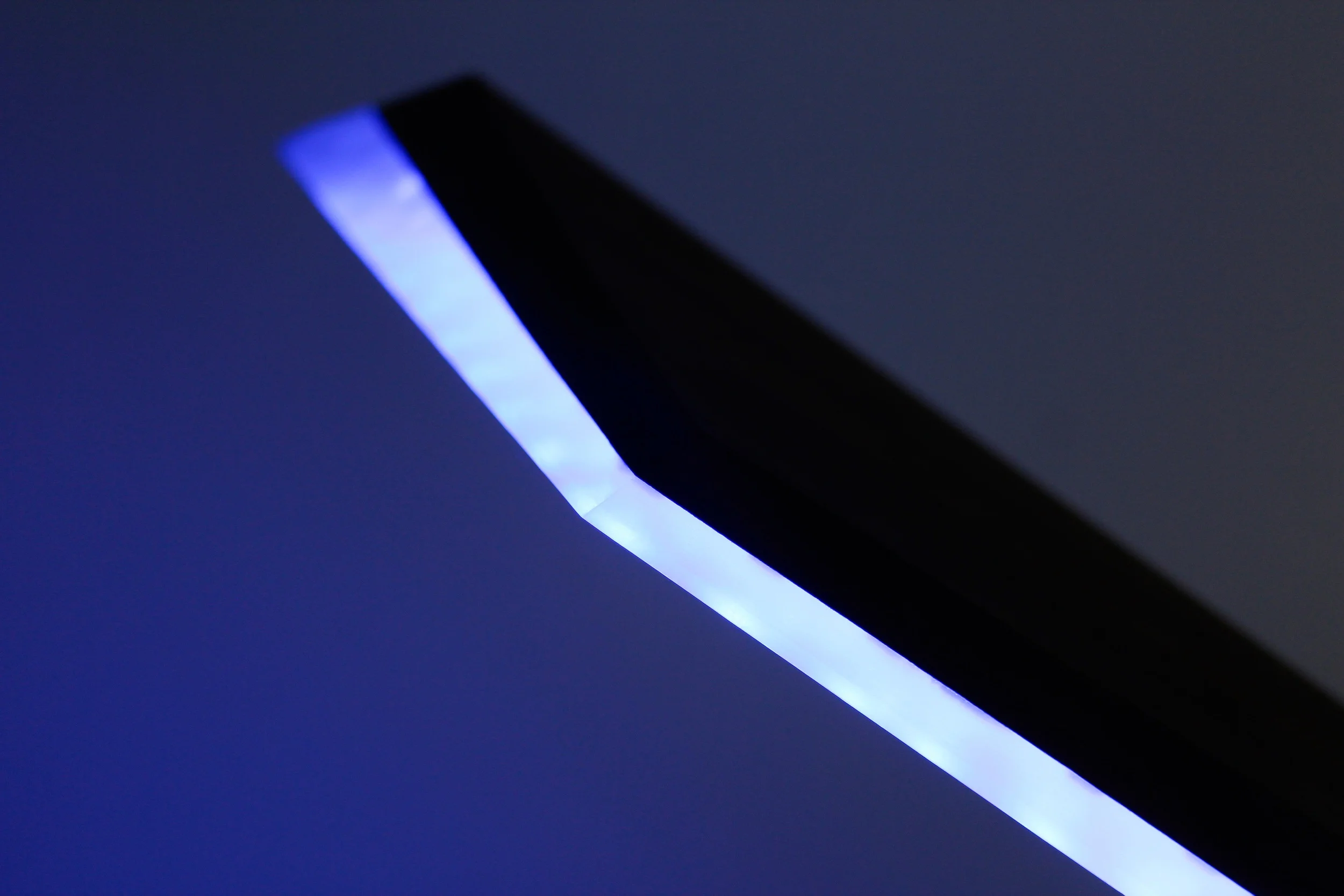 The resin diffuser seamlessly conceals a dense LED array