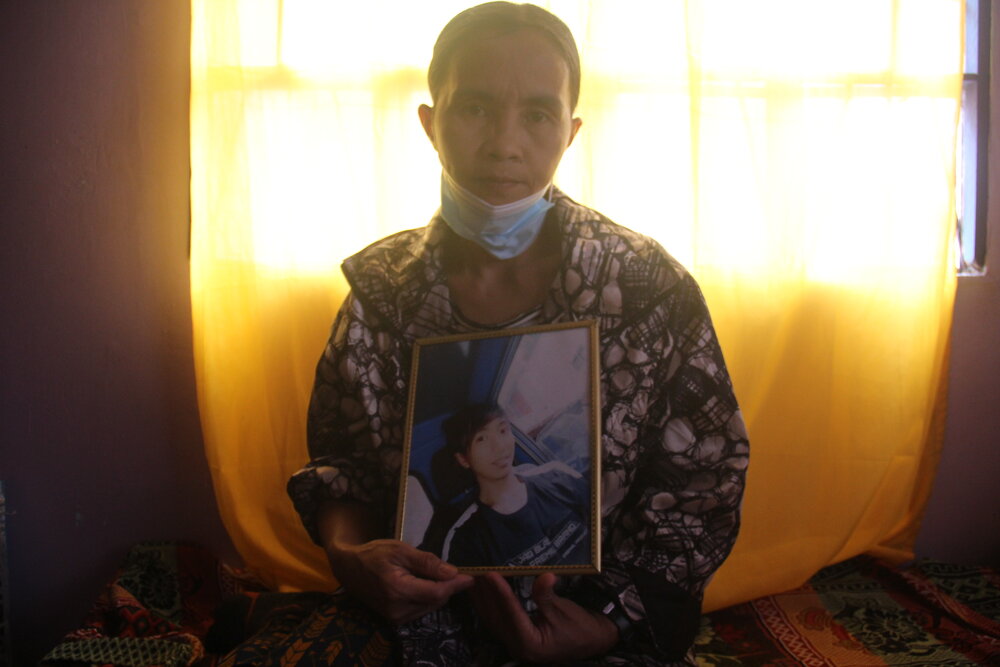  Linda Lagman holds a photograph of her son Harjan, whose headless body was found with several hack wounds Nov. 12, 2020. Unable to forget the death of her son, Linda continues to fight for justice. 