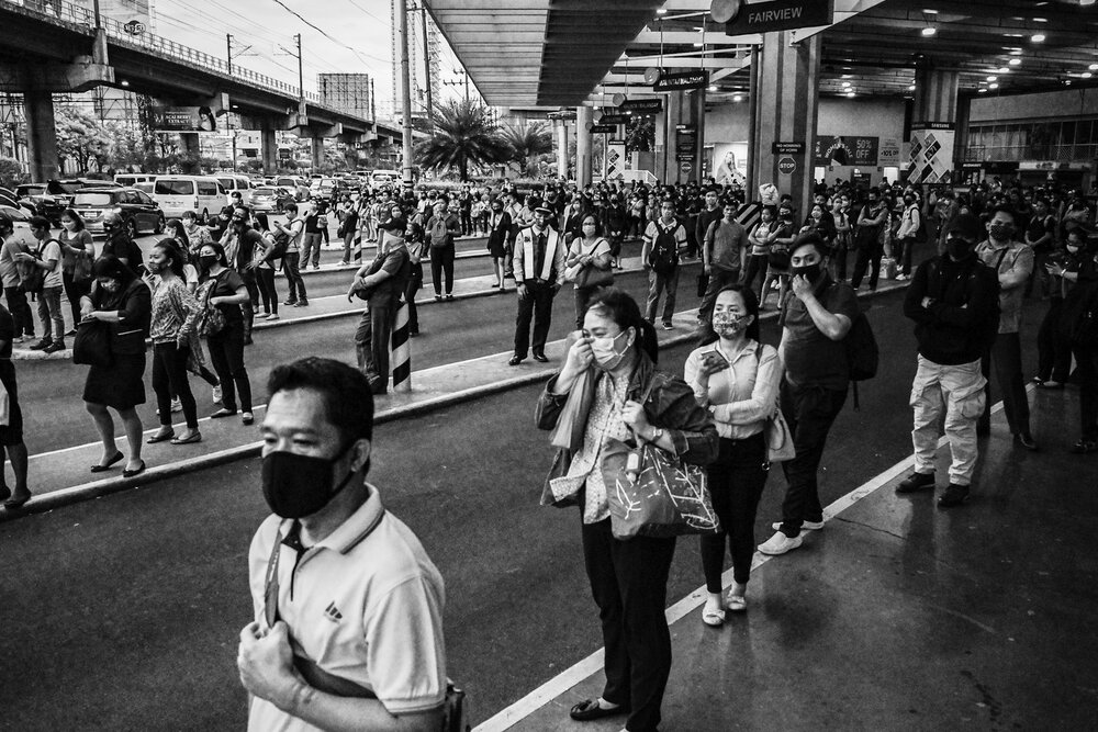 Thousands of commuters pack bus stops and other transport stations, enduring long and exhausting queues across Metro Manila, after the government imposes a 30-day Luzon-wide lockdown or 'community quarantine' effective March 17, 2020 to contain the 