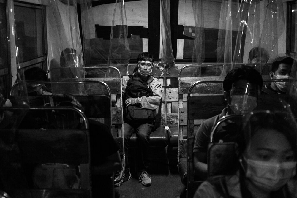  Ervine rides a regular non-airconditioned bus from Kamuning late at night to his home in San Jose del Monte, Bulacan. He considers pre-pandemic commuting better despite heavy traffic and long travel hours. ‘Today, aside from waking up early, the far