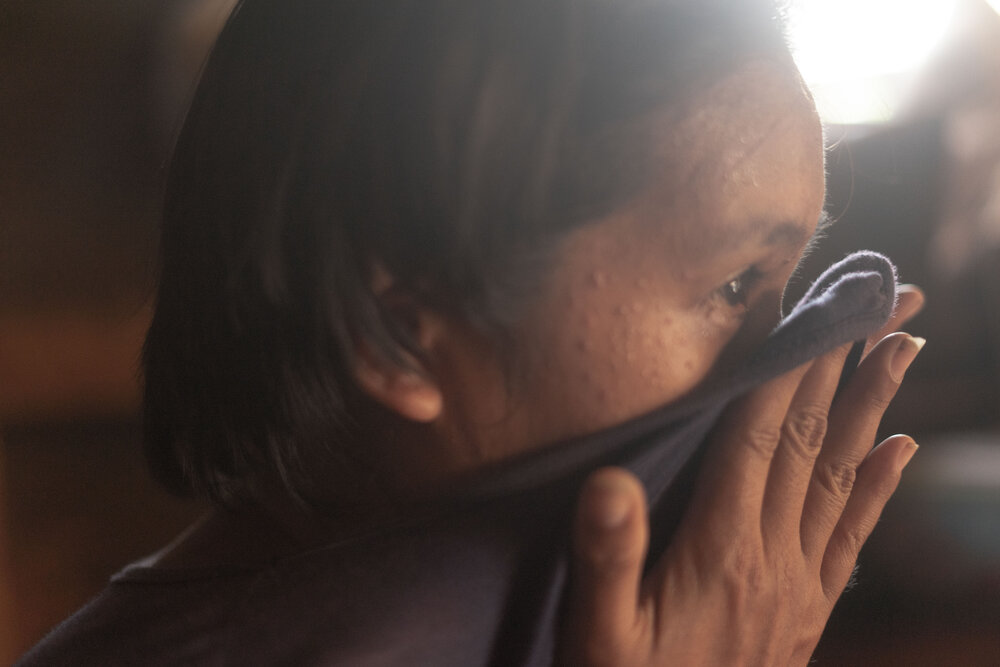  Amy (not her real name) sobs as she recalls the day she bid goodbye to her sons at their home in Smokey Mountain on March 28, 2021. Her pastor offered to help her sons through a foster care program accredited by the Department of Social Welfare and 