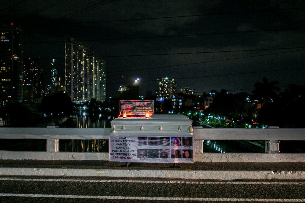 Two coffins with anti-communist slogans are placed at Guadalupe Bridge in Makati and in Quezon City on March 28, the founding anniversary of the communist-led New People’s Army. Names and faces of student-youth activists who joined the armed struggl