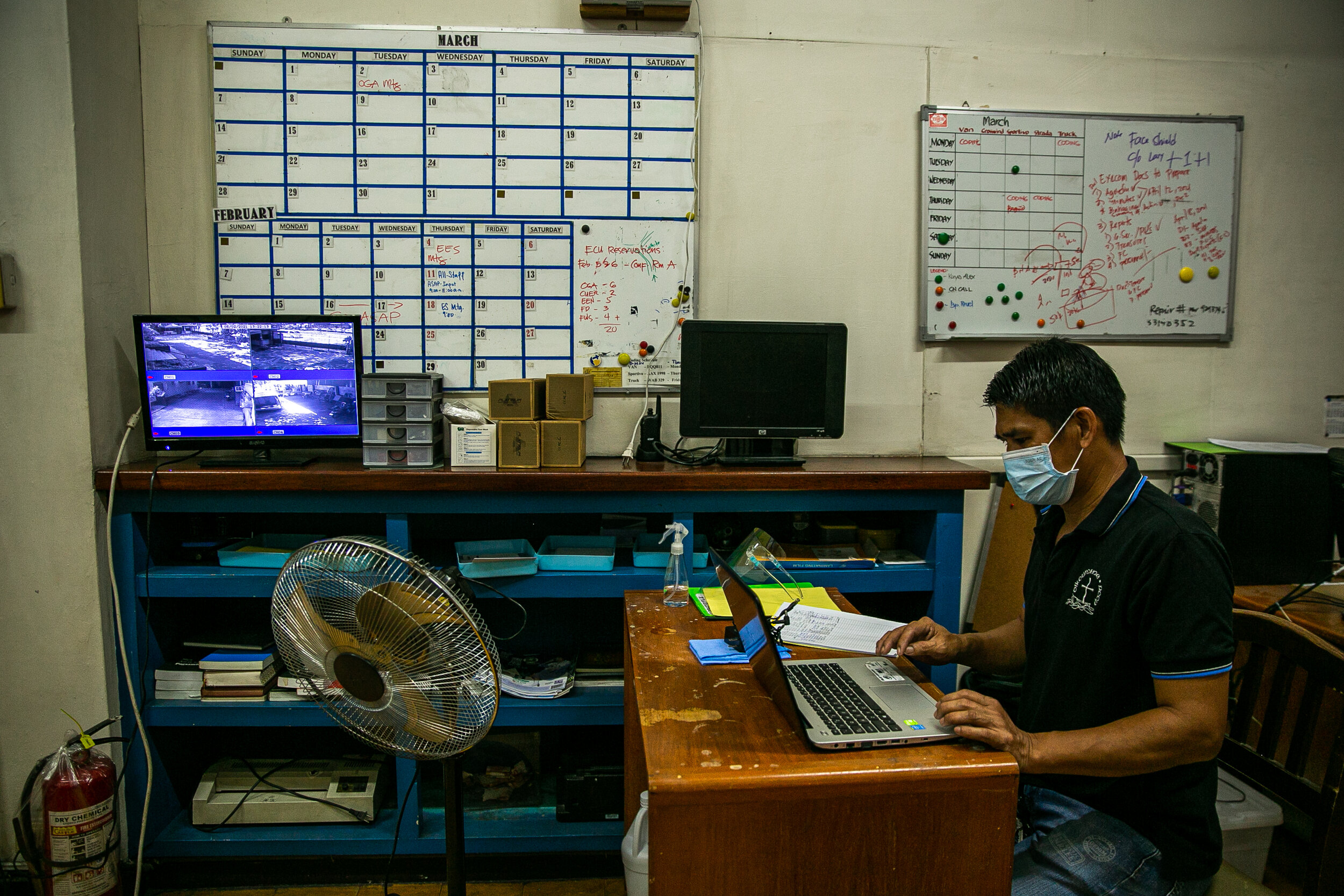  A church worker reviews security footage in the office of the National Council of Churches in the Philippines (NCCP) in Quezon City. The NCCP installed additional cameras within its perimeter to record and monitor the people who come in and out of t