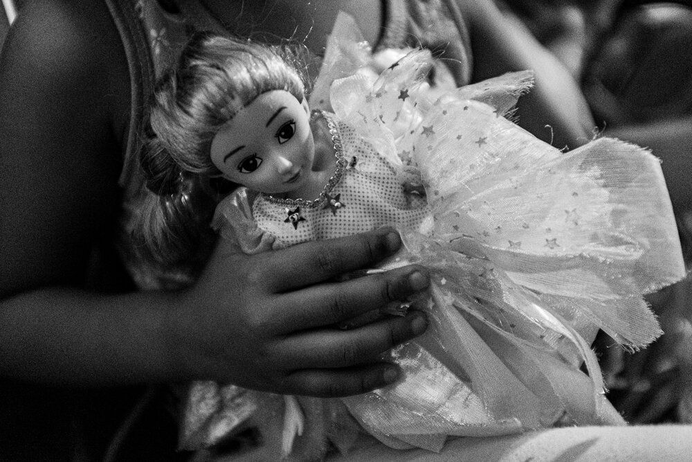  Tiffany plays with her doll at her father’s home in Pinagbuhatan, Pasig on March 28, 2021. Mace and her husband separated after he learned about her condition. He also got himself tested along with their two children. ‘My ex-husband doesn't want to 