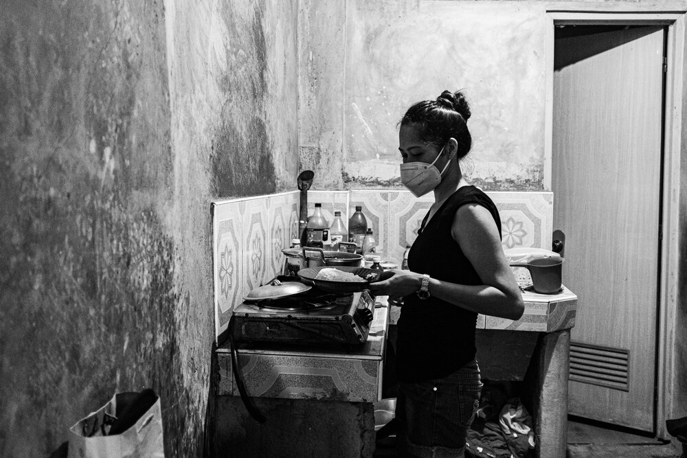  Mace prepares her children’s lunch at her ex-husband’s home in Pinagbuhatan, Pasig on March 28, 2021.&nbsp; From  January  to  March 2021 , a total of 2,786 newly diagnosed cases were reported, out of which 2,647 were male and 139 were female. Twent