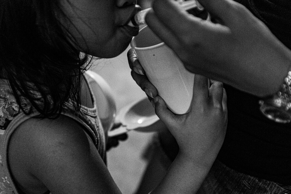  Tiffany, assisted by her mother, takes her medicine from a needle-free syringe at her father’s home in Pinagbuhatan, Pasig on March 28, 2021. ‘I want her to be able to finish school,’ Mace, her mother, said. In the first quarter of 2021, a total of 