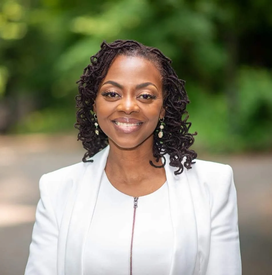 Woman in professional headshot