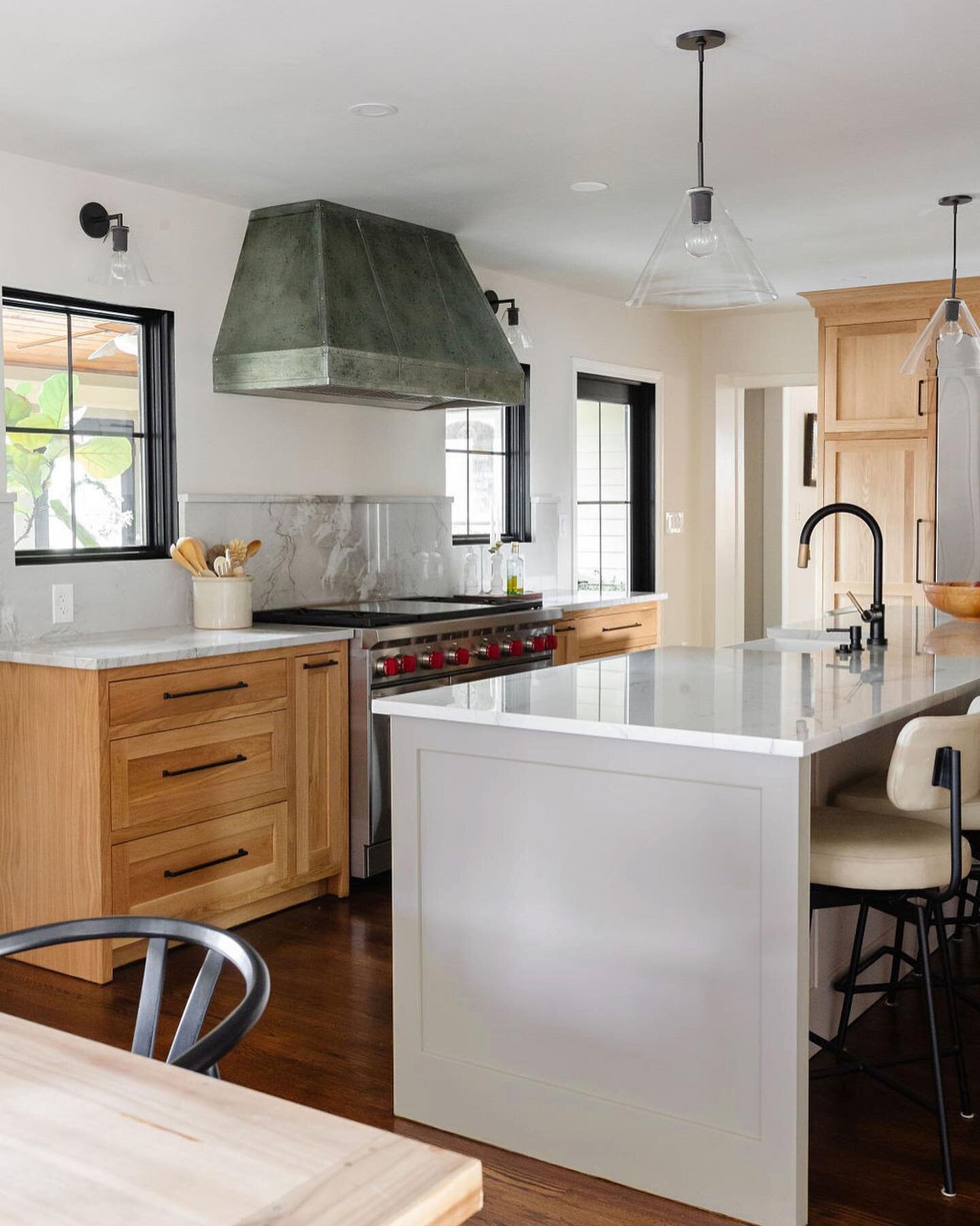 It&rsquo;s hard to imagine this space before the renovation.  Walls were removed, floors were raised, and now this family has a more functional kitchen.  Custom inset,
white oak cabinetry line the perimeter and a generous island fills the center of t