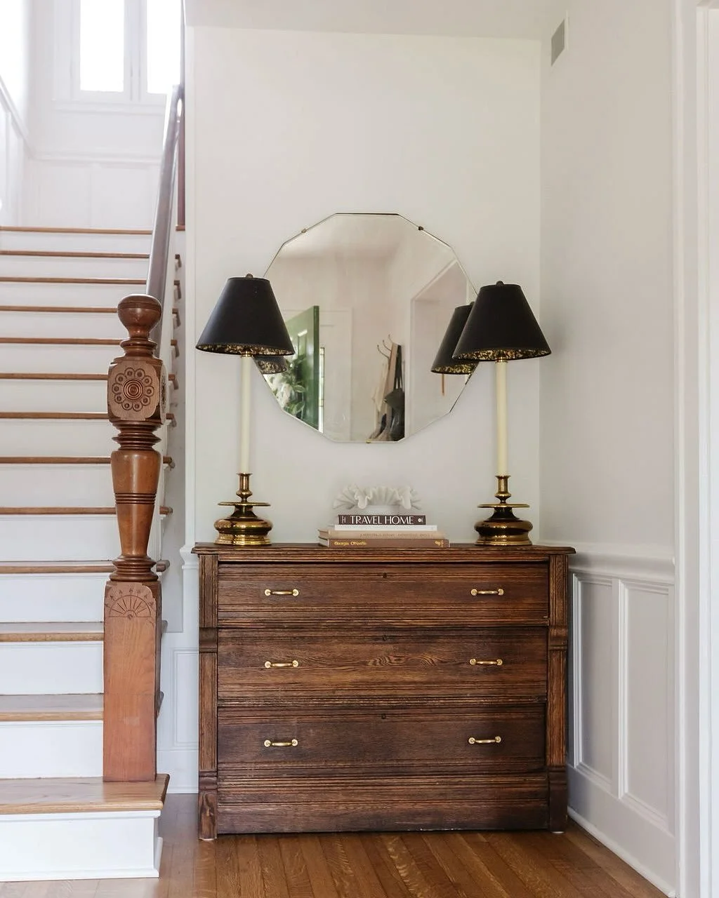 With the support of the homeowners, our team reimagined the flow of the home&mdash;eliminating the original center hall to create a larger, light-filled kitchen, widening the opening to the dining room, and reclaiming a captured backroom to expand th
