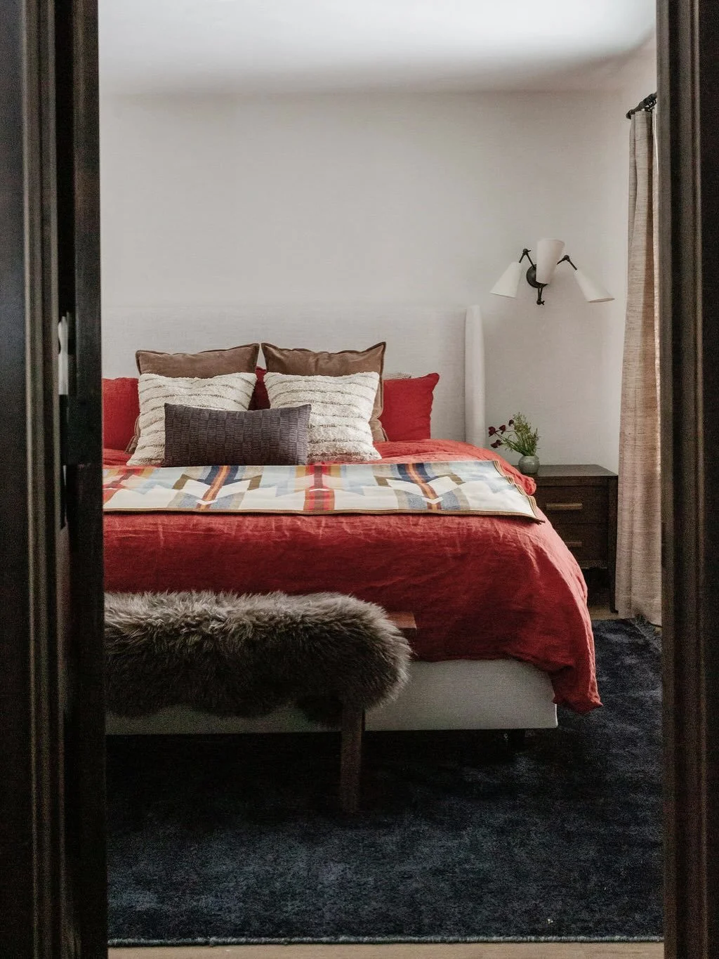 This mountain house primary suite got a warm, intentional upgrade.

Originally, the sink and linen closet lived right in the bedroom &mdash; so we reimagined the layout and created a fully private bathroom suite that feels both elevated and tucked aw