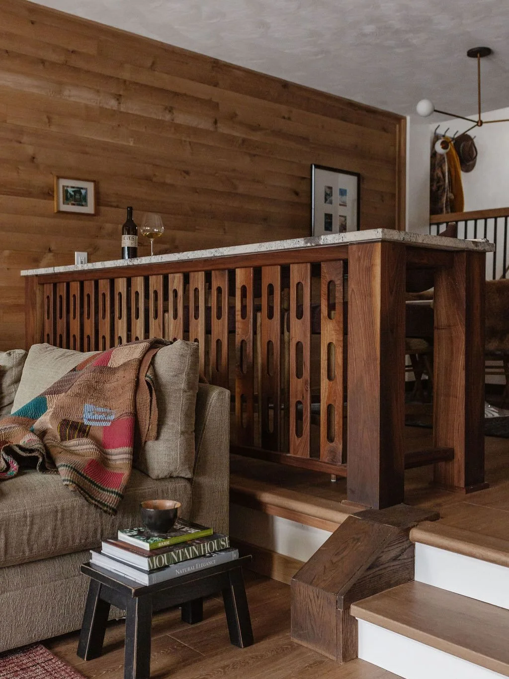 We wanted to reimagine the existing railing that divided the living and dining rooms&mdash;keeping the open concept while giving the space more purpose and personality.

In collaboration with @timberandsteelcompany, we designed a custom railing that 