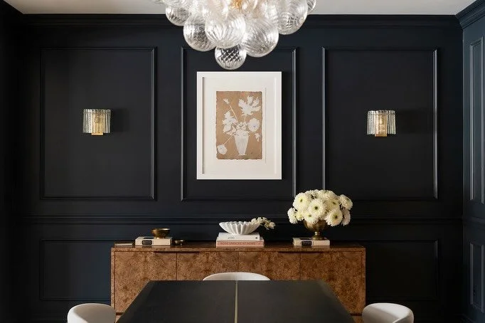 We introduced paneling and moldings to add architectural interest to the rooms, and finished the walls with a rich, moody, saturated color to balance the visual weight of the champagne bar on the opposing wall.

Photography by @erinashkelly 

#Babban