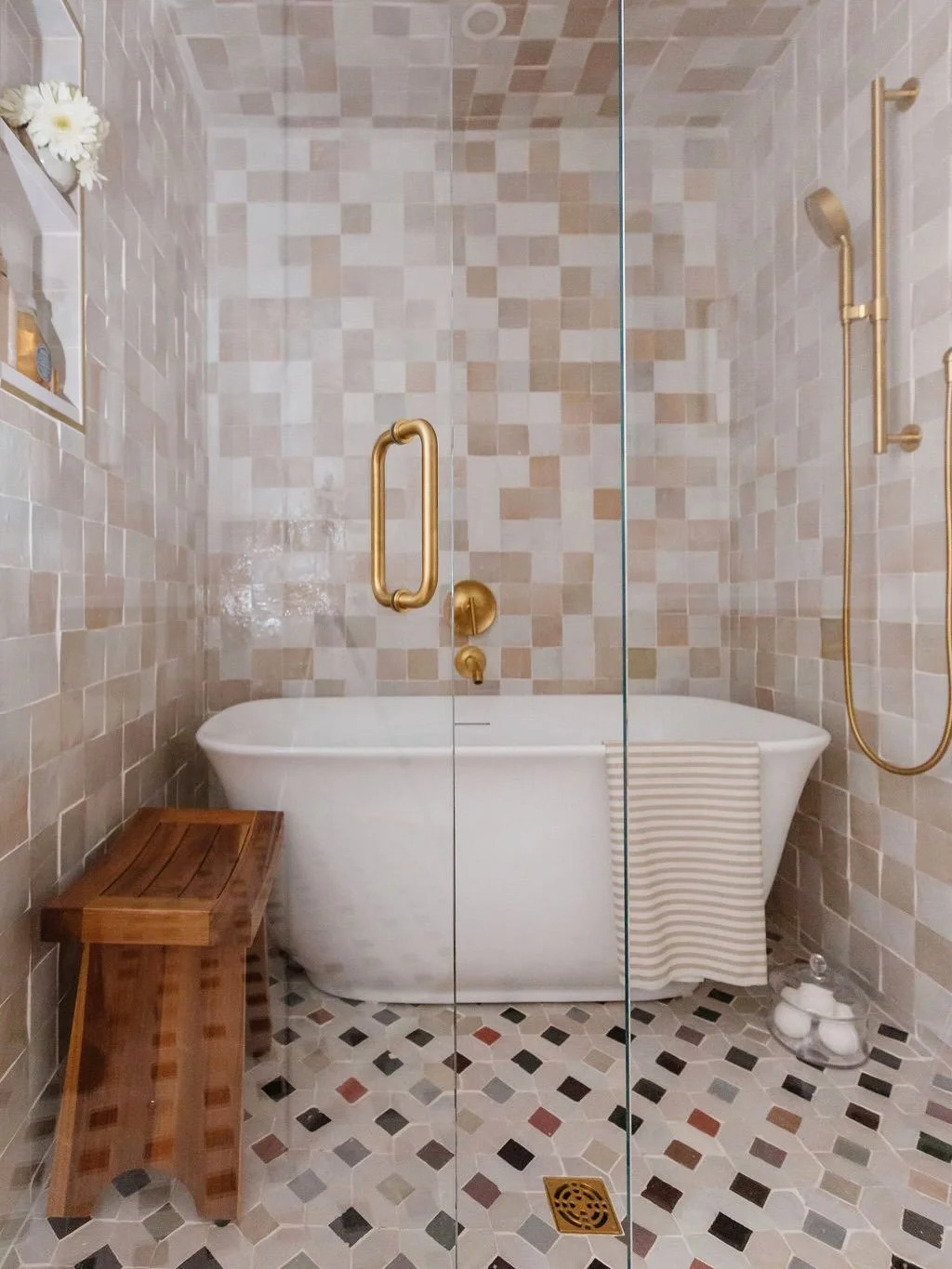 We created a wet room setup&mdash;where the tub and shower are enclosed in glass&mdash;keeping all the splashing in one easy-to-clean space. Perfect for kids, it turns bath time into a fun (and contained!) experience without the usual mess.

Less str