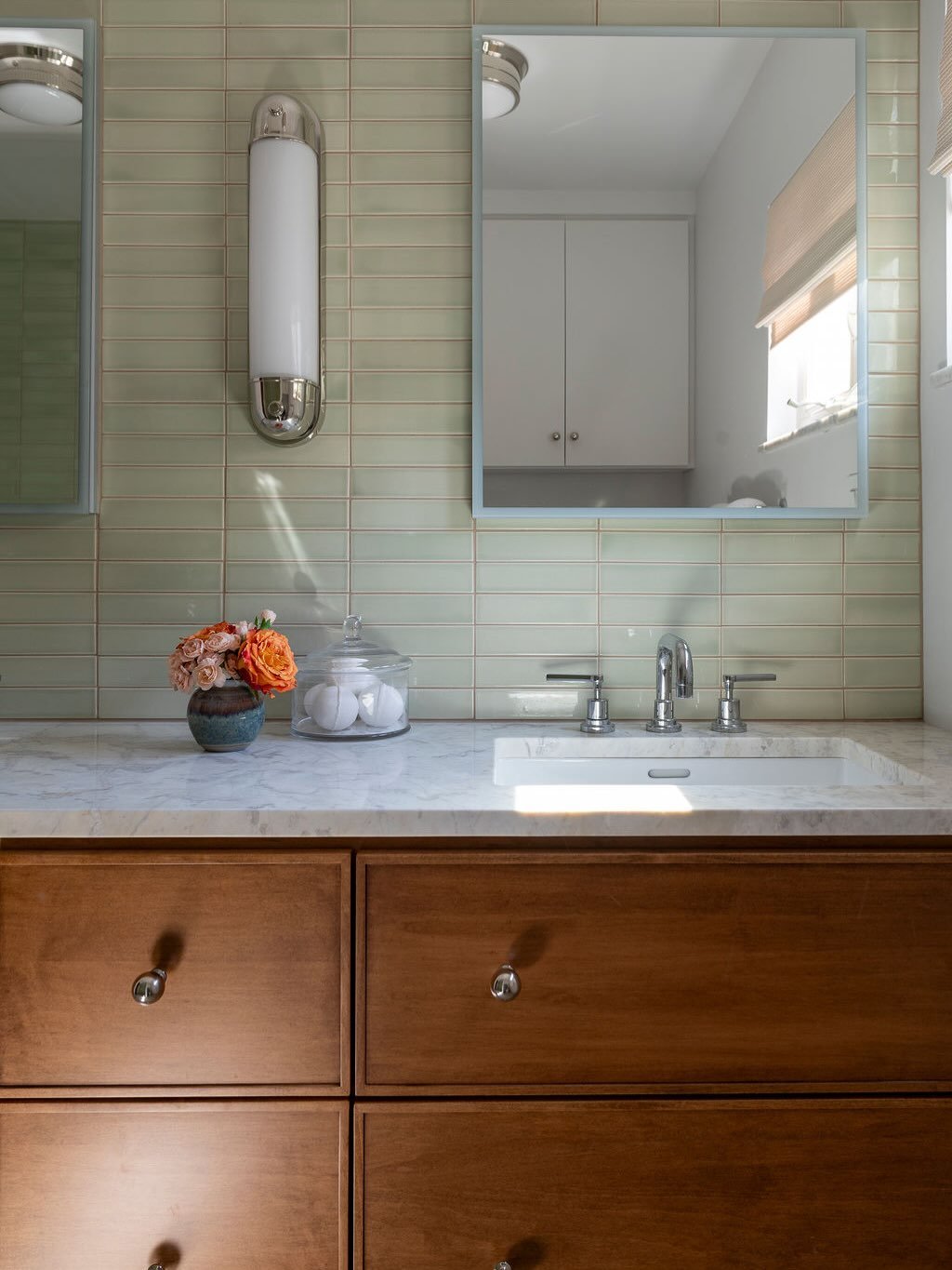 For this primary bathroom renovation, strategic planning allowed us to transform a compact footprint into a retreat that is as functional as it is beautiful. By incorporating the existing linen closet into the bathroom and relocating the toilet to th