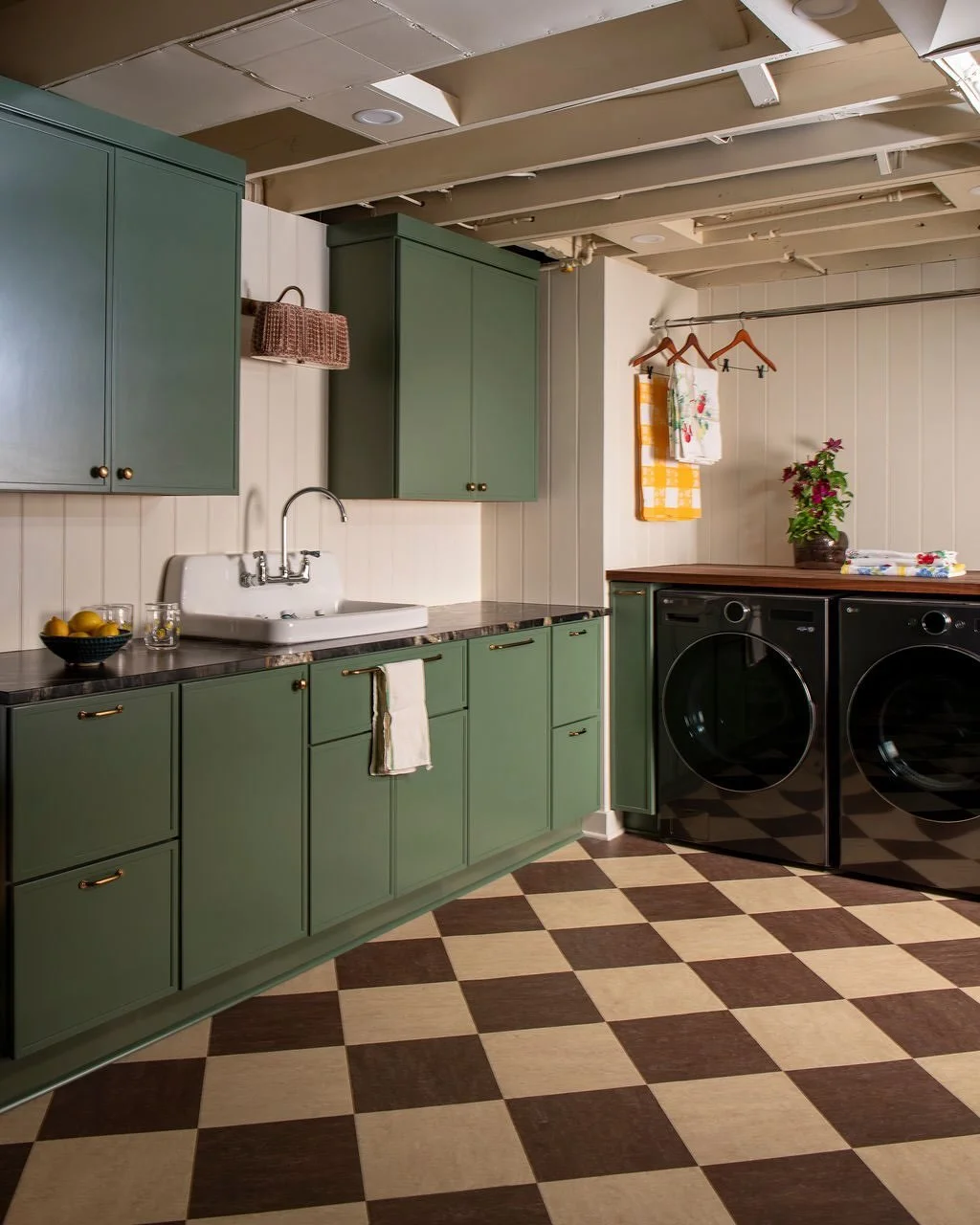 The lower-level utility spaces were thoughtfully reimagined to serve as both hardworking and beautiful extensions of the home. By relocating the mechanical equipment, the laundry room became a multifunctional hub for storage, mudroom needs, entertain
