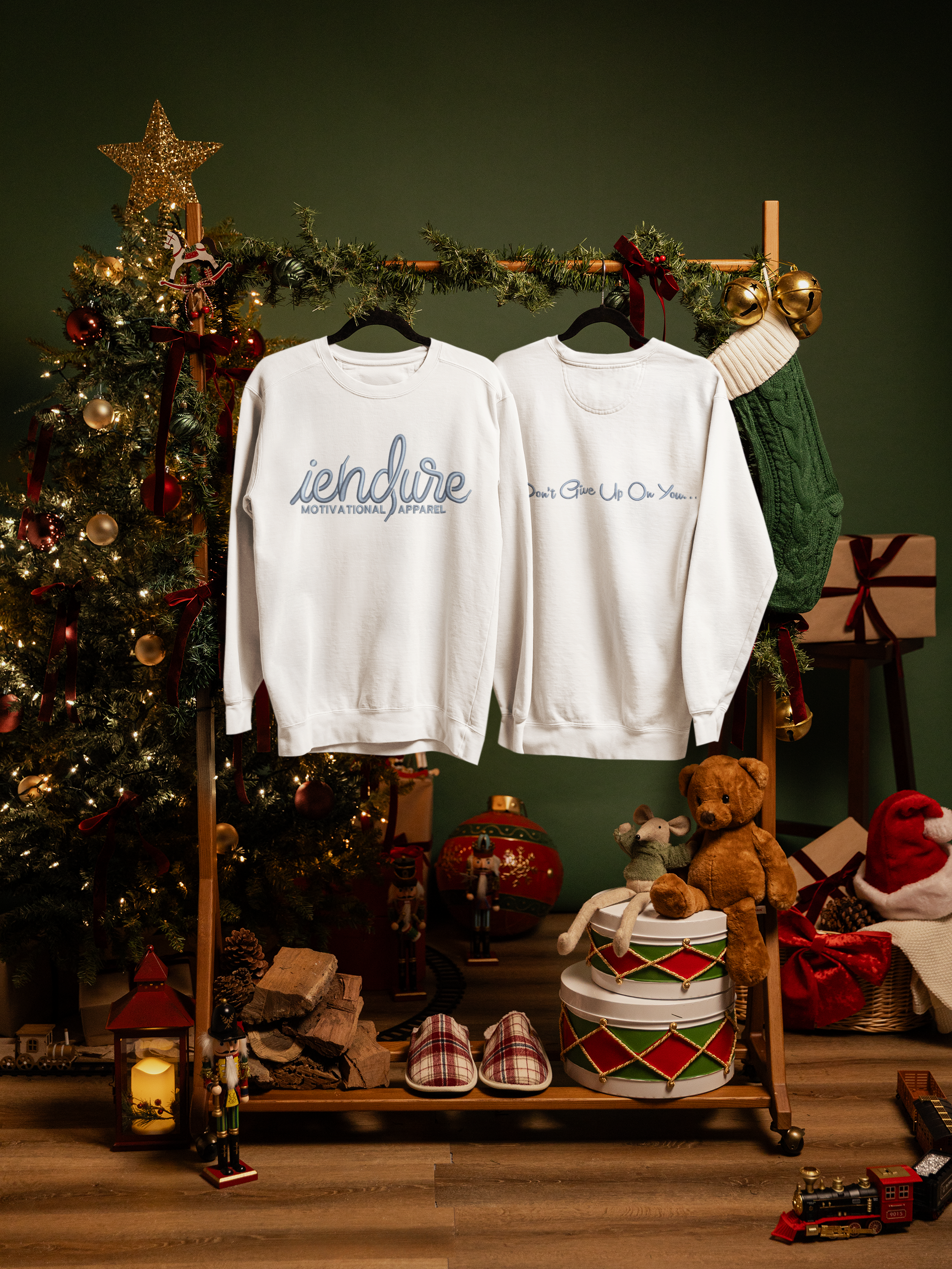 comfort-colors-1566-mockup-featuring-two-sweatshirts-hanging-in-a-christmas-decorated-setting-m59311 (1).png