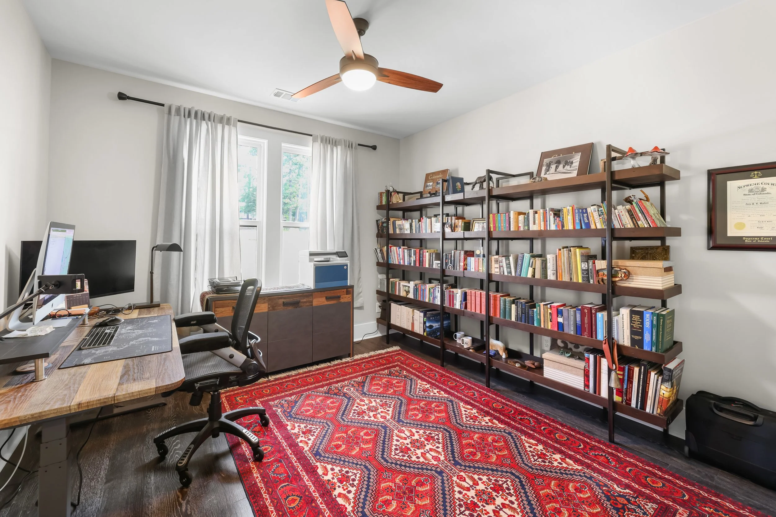 Second bedroom currently used as a home office at 615 Misty Banks Drive